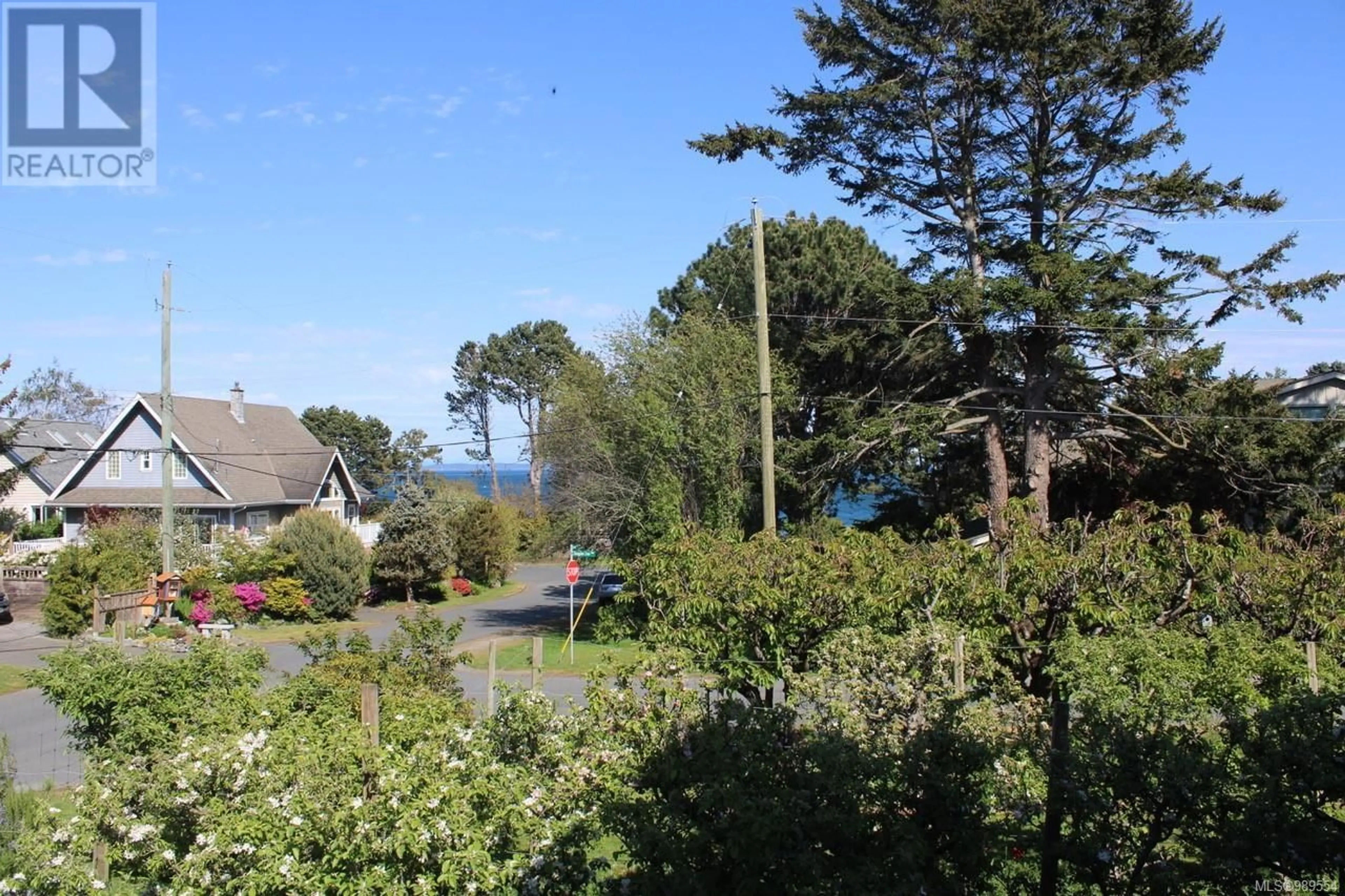 A pic from outside/outdoor area/front of a property/back of a property/a pic from drone, water/lake/river/ocean view for 3990 SMUGGLERS COVE ROAD, Saanich British Columbia V8N4M2