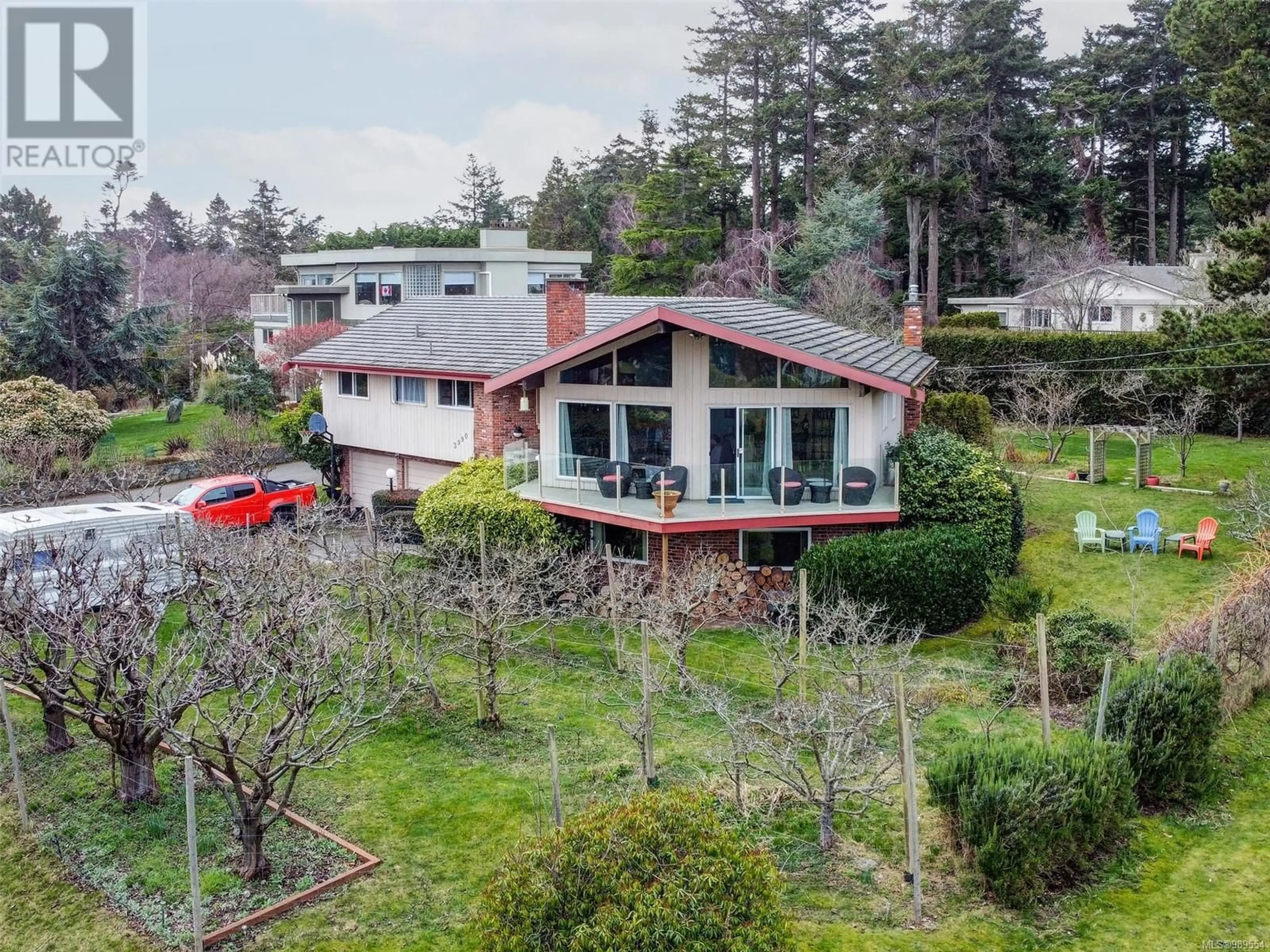 A pic from outside/outdoor area/front of a property/back of a property/a pic from drone, unknown for 3990 Smugglers Cove Rd, Saanich British Columbia V8N4M2