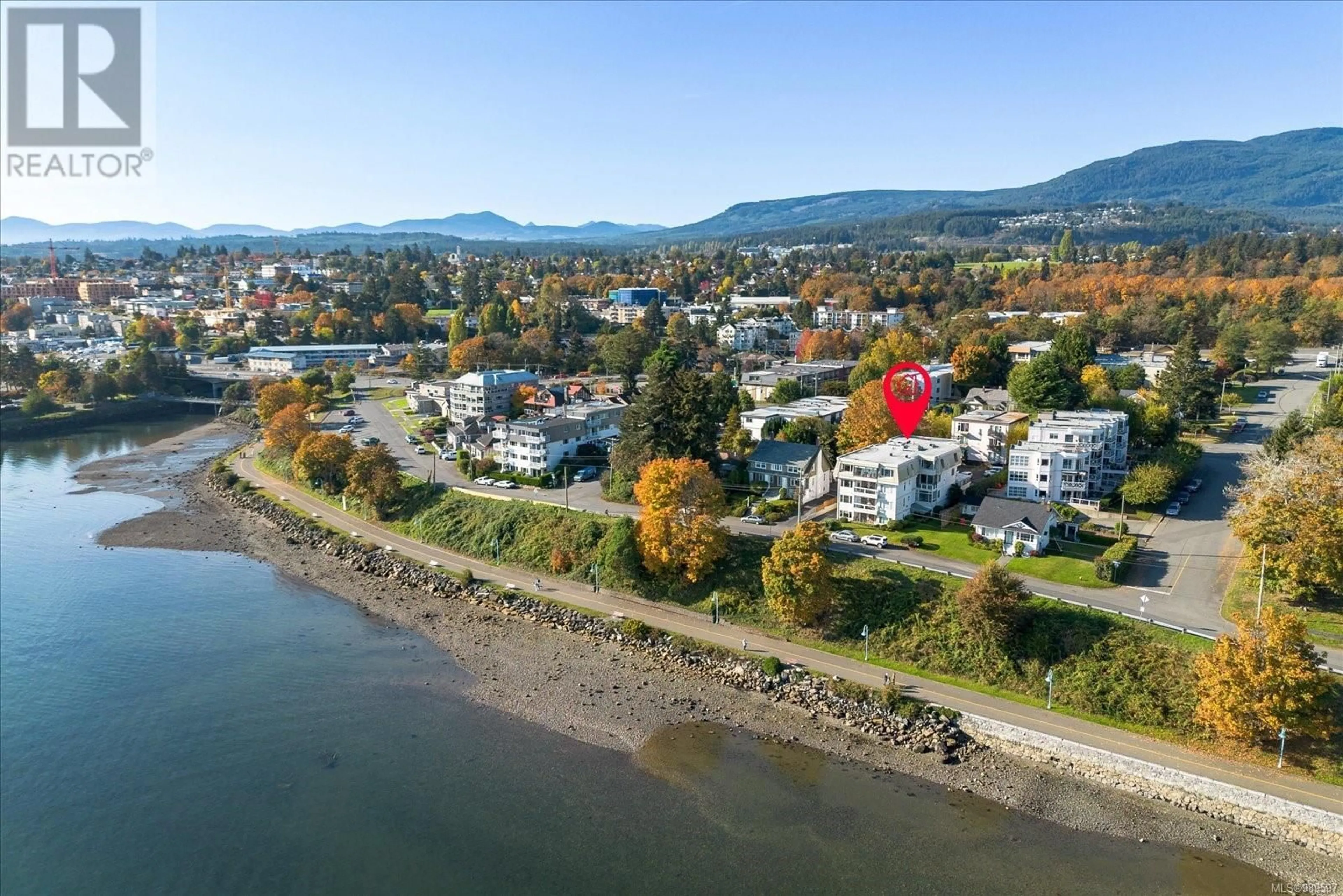 A pic from outside/outdoor area/front of a property/back of a property/a pic from drone, water/lake/river/ocean view for 101 145 Newcastle Ave, Nanaimo British Columbia V9S4H7