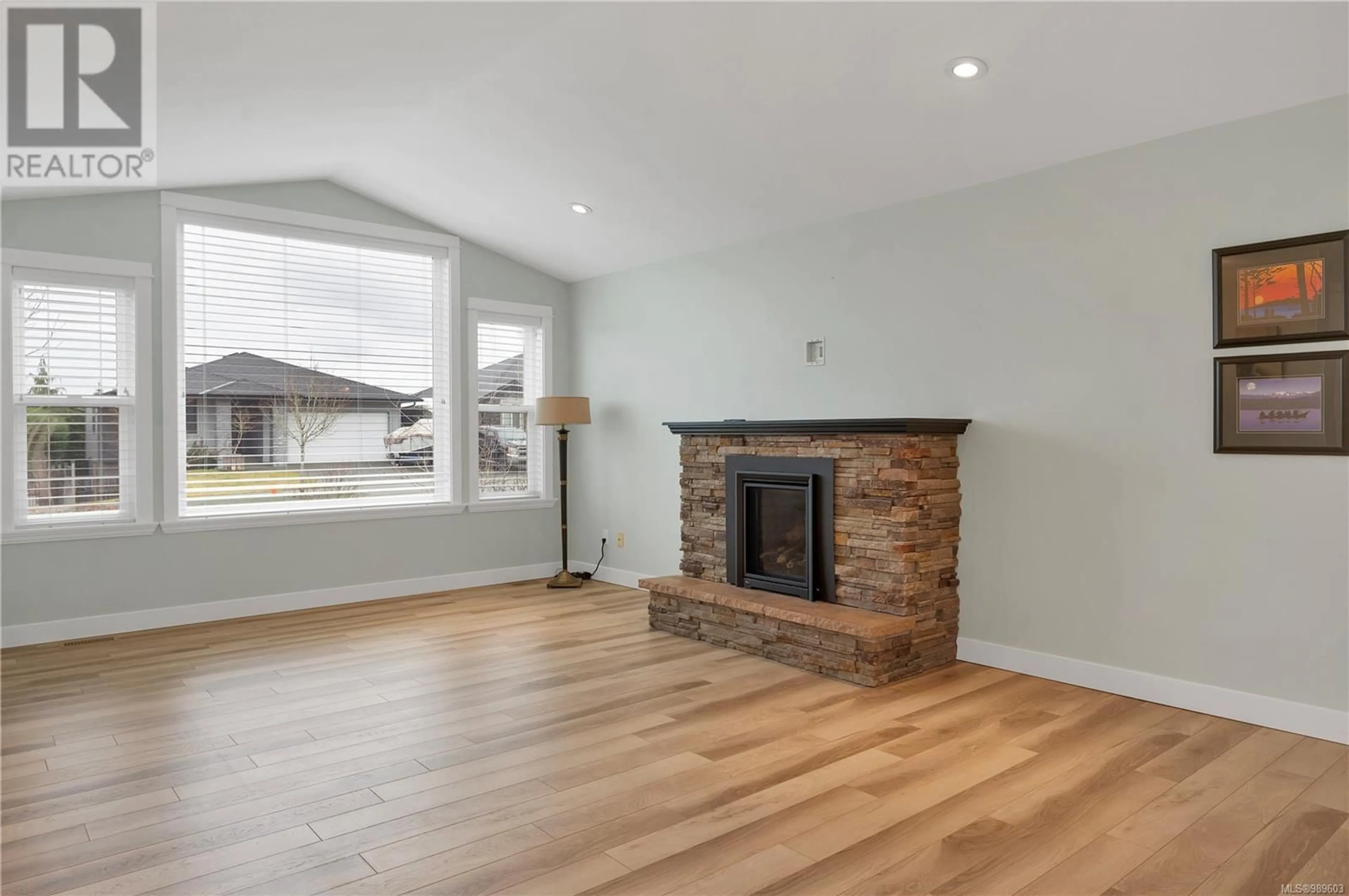 Living room with furniture, wood/laminate floor for 1117 Cordero Cres, Campbell River British Columbia V9H0B6