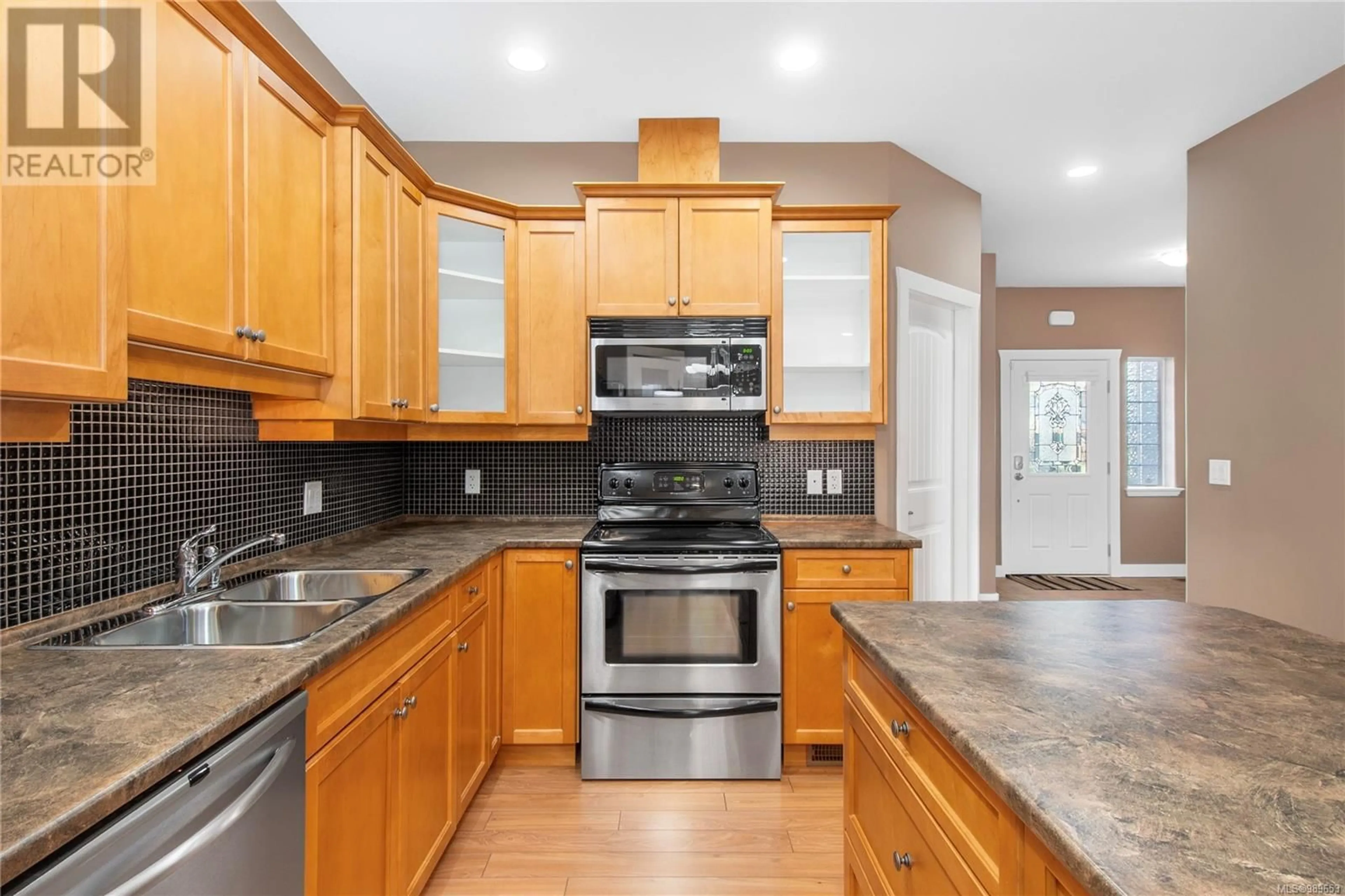 Open concept kitchen, unknown for 12 346 Erickson Rd, Campbell River British Columbia V9W1S7