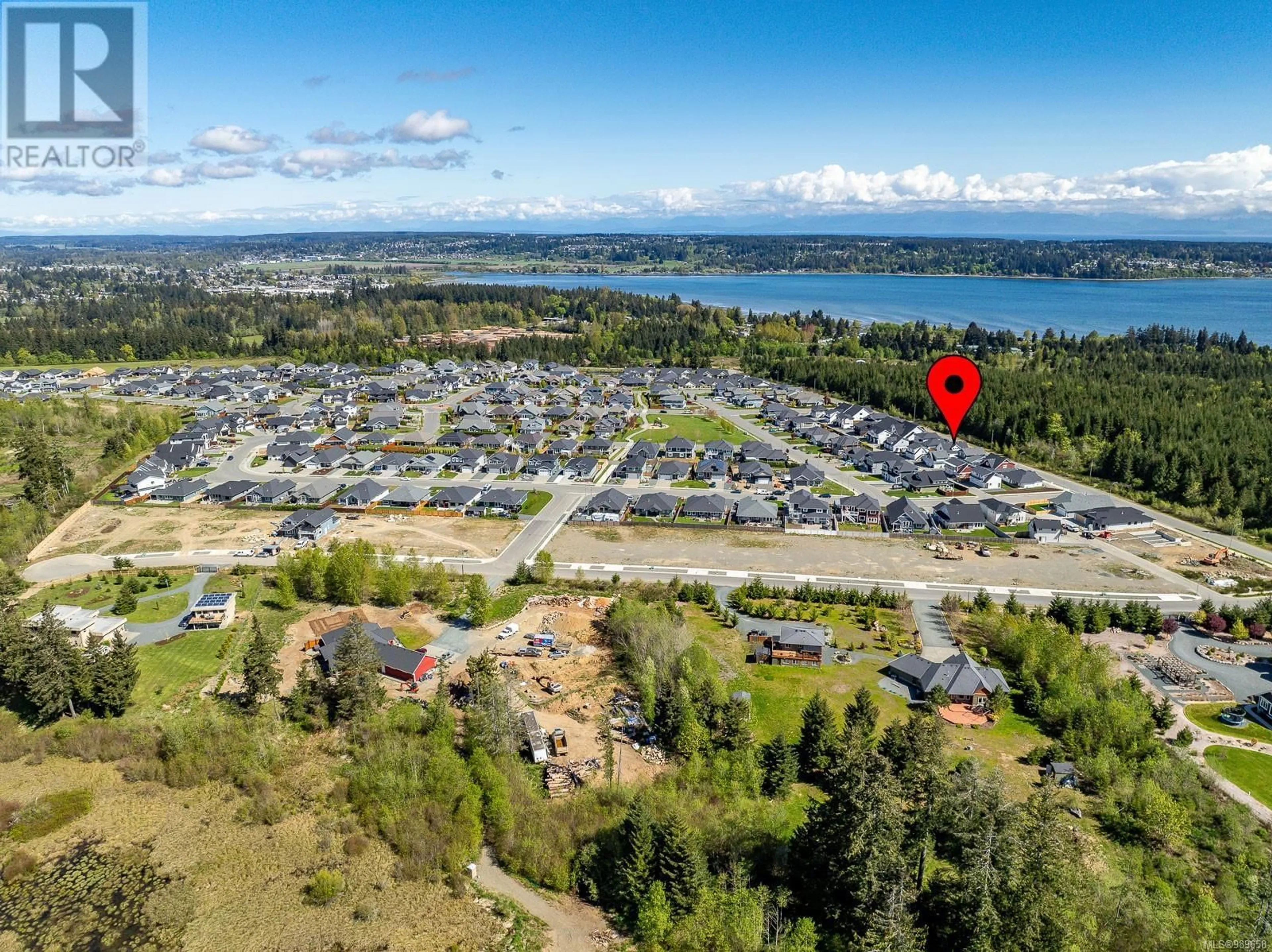 A pic from outside/outdoor area/front of a property/back of a property/a pic from drone, water/lake/river/ocean view for 4017 Buckstone Rd, Courtenay British Columbia V9N0B4