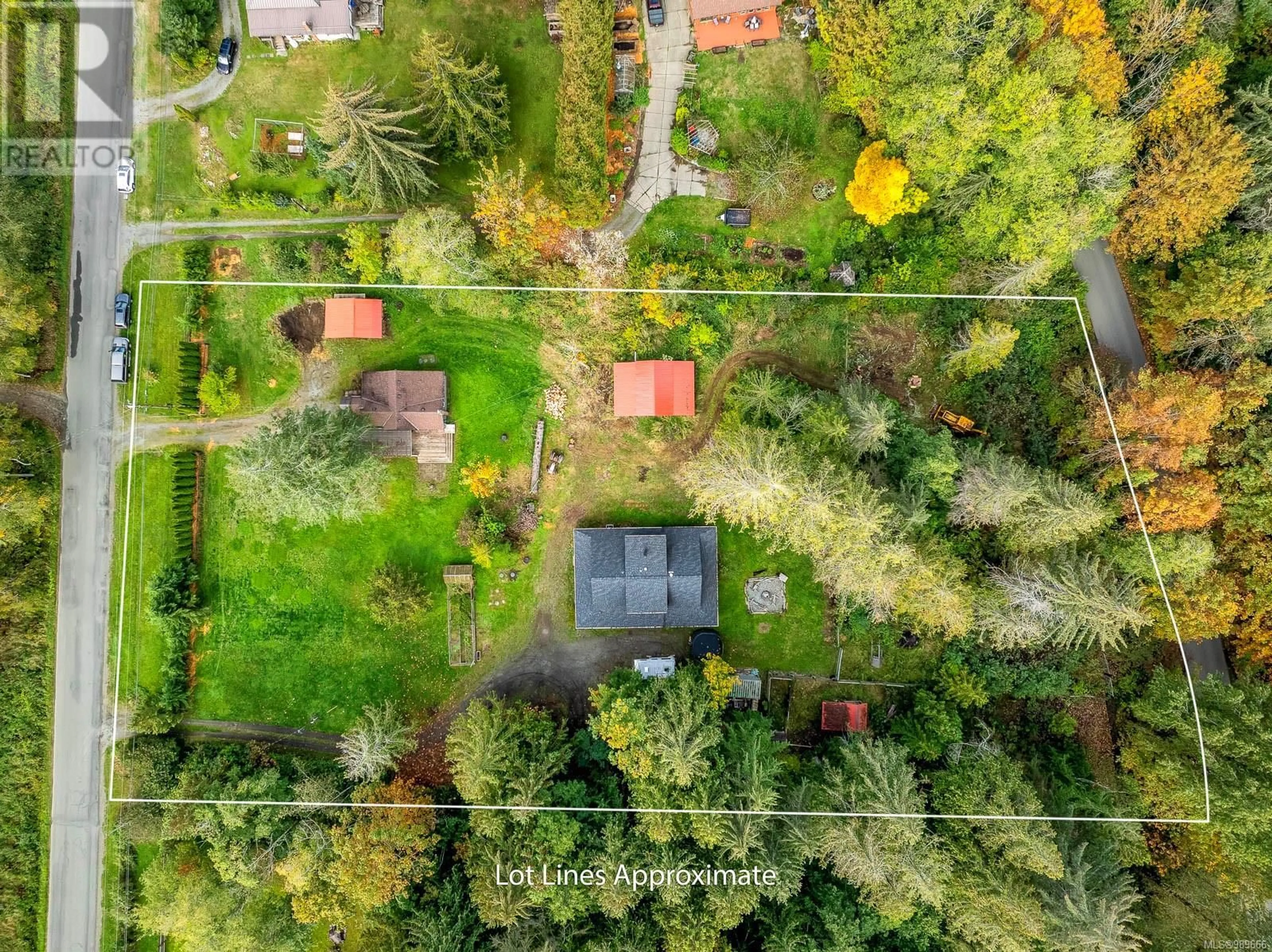 A pic from outside/outdoor area/front of a property/back of a property/a pic from drone, forest/trees view for 4390/4386 Marsden Rd, Courtenay British Columbia V9N9M4