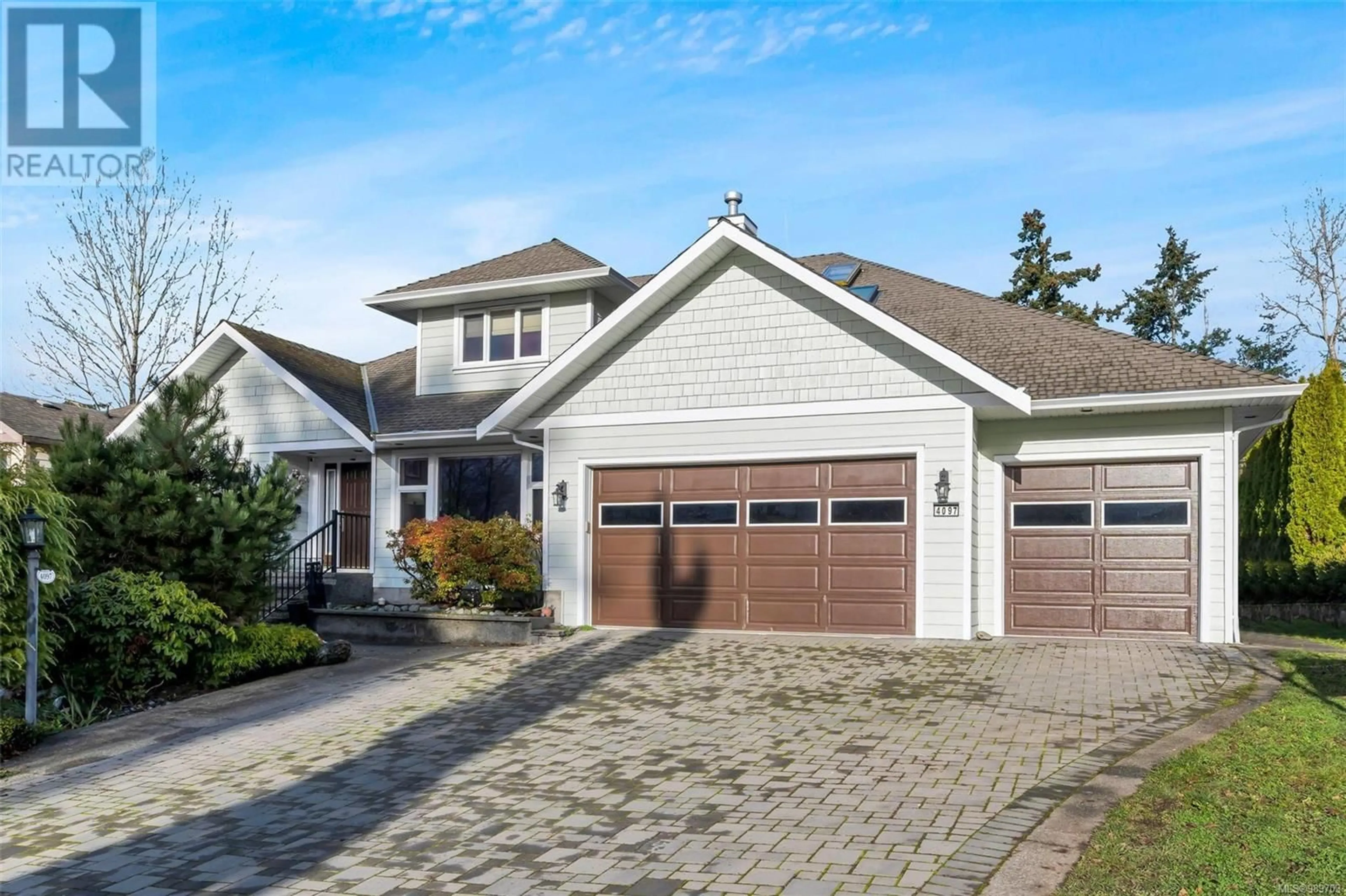 Home with vinyl exterior material, street for 4097 Braefoot Rd, Saanich British Columbia V8X2B8