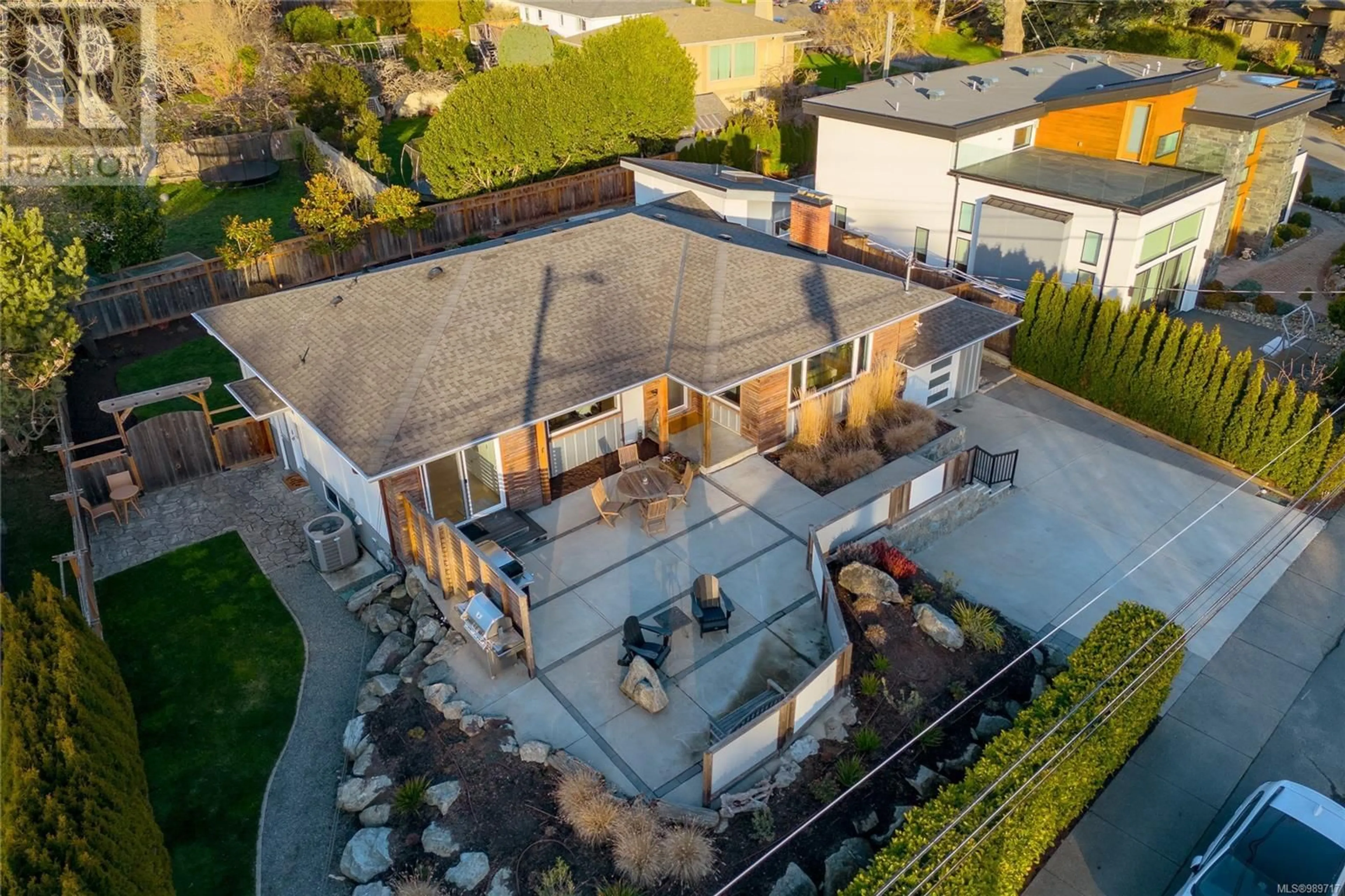 A pic from outside/outdoor area/front of a property/back of a property/a pic from drone, street for 3920 Cadboro Bay Rd, Saanich British Columbia V8N4G8