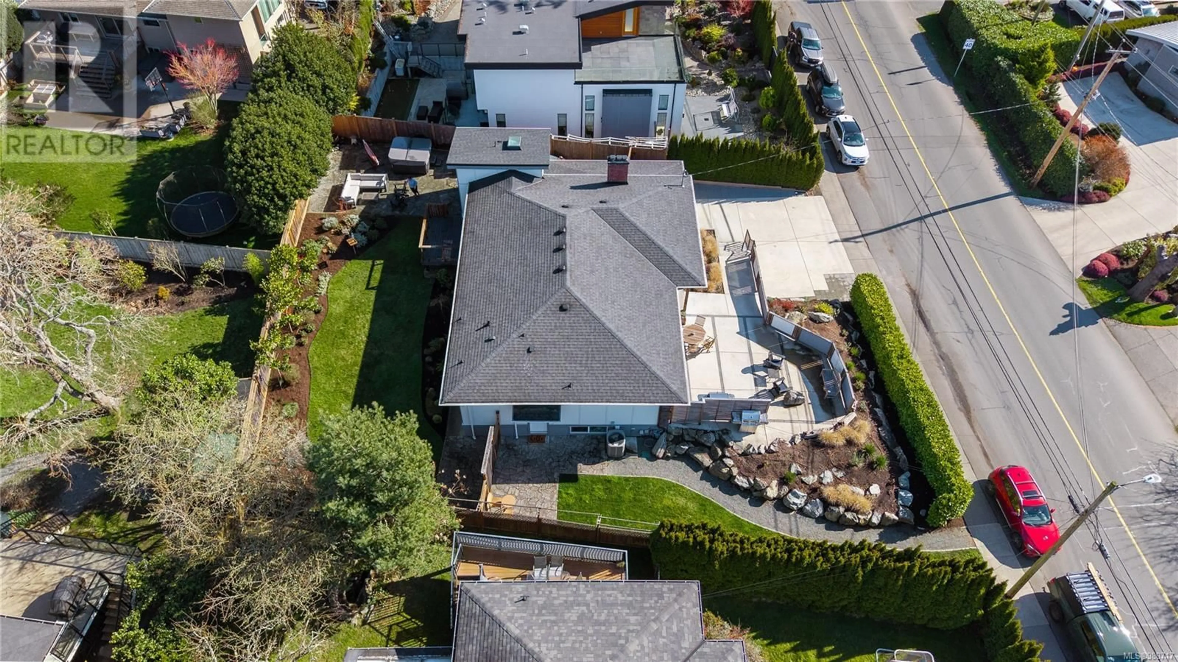 A pic from outside/outdoor area/front of a property/back of a property/a pic from drone, street for 3920 Cadboro Bay Rd, Saanich British Columbia V8N4G8