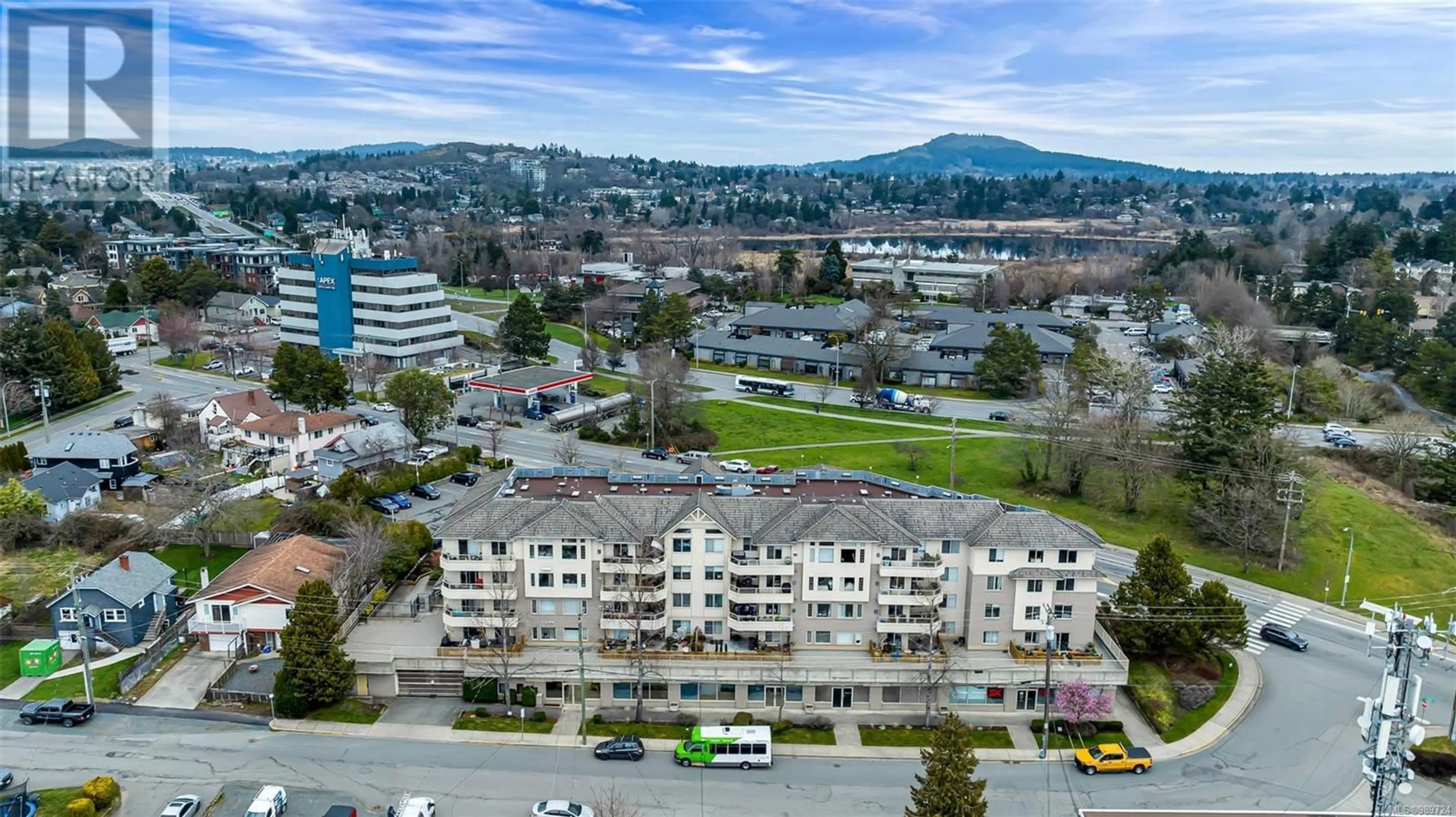 A pic from outside/outdoor area/front of a property/back of a property/a pic from drone, mountain view for 401 3700 Carey Rd, Saanich British Columbia V8Z4C2