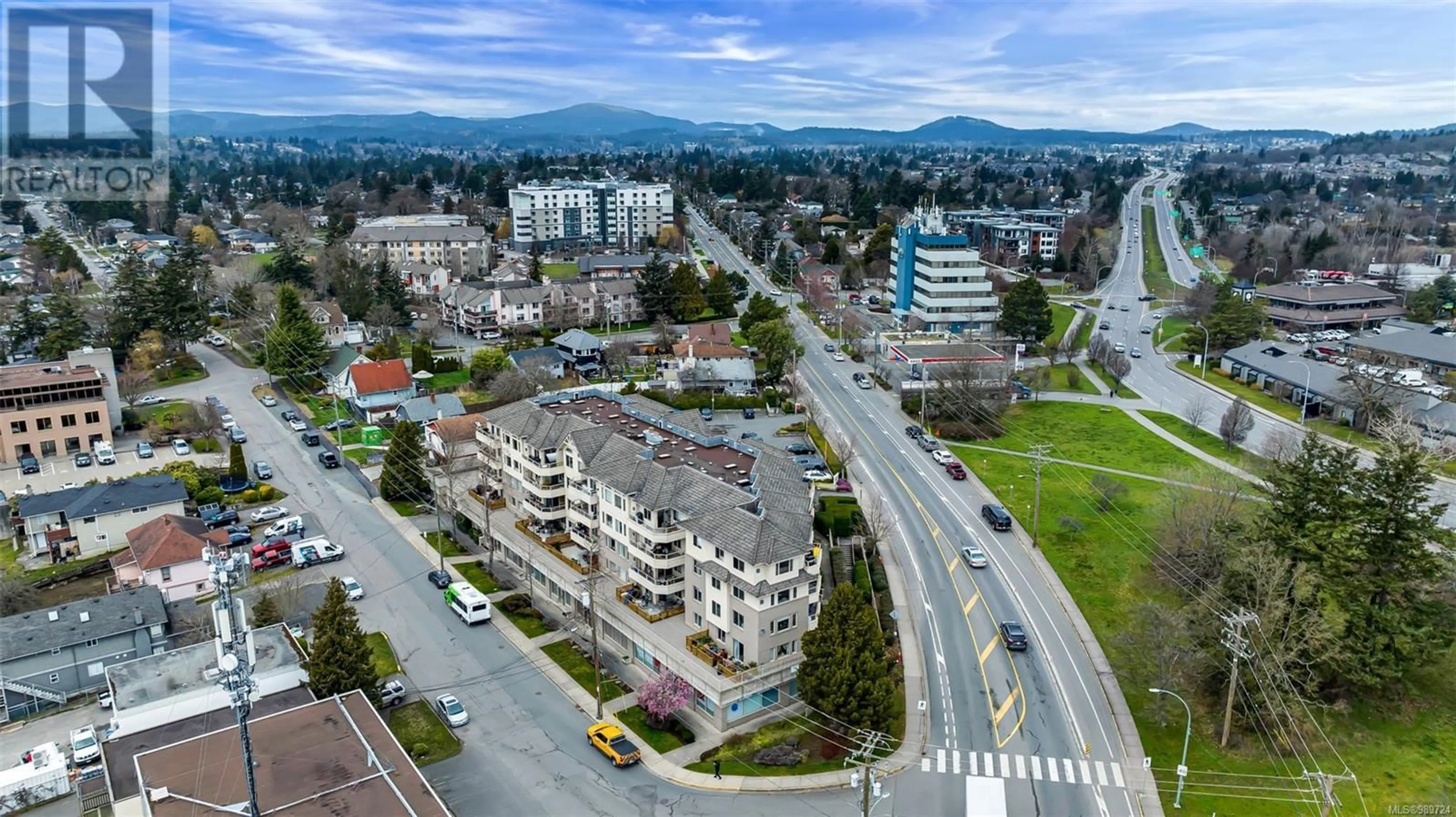 A pic from outside/outdoor area/front of a property/back of a property/a pic from drone, unknown for 401 3700 Carey Rd, Saanich British Columbia V8Z4C2