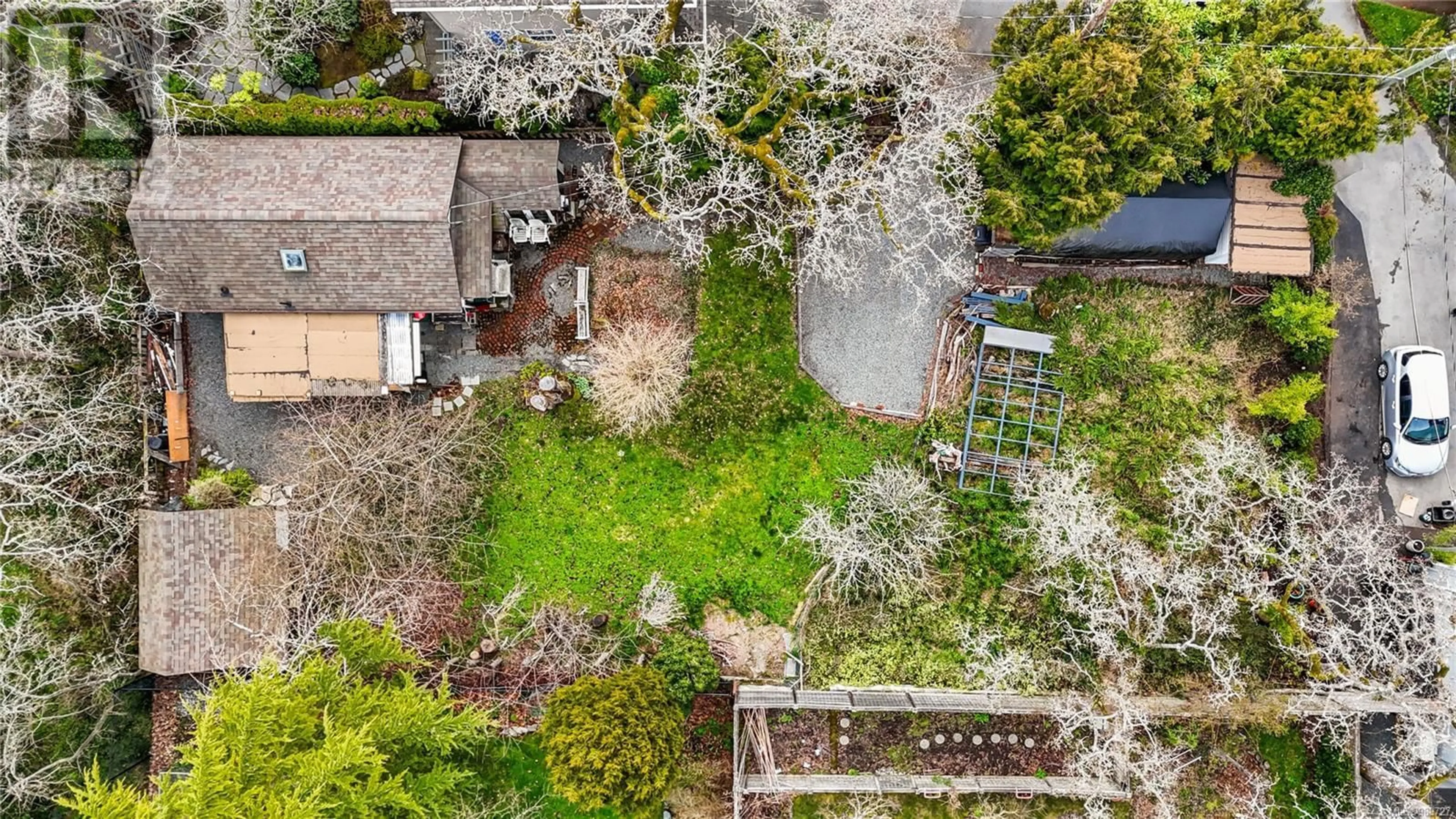 A pic from outside/outdoor area/front of a property/back of a property/a pic from drone, street for 3459 Carter Dr, Saanich British Columbia V8P4V1