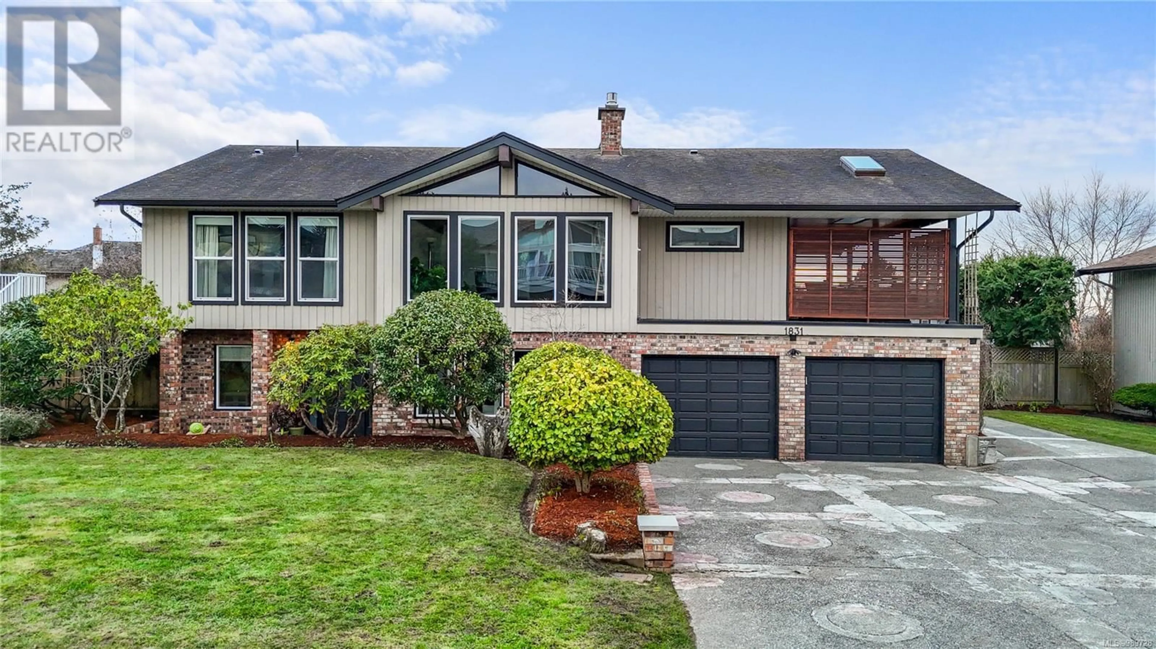 Home with brick exterior material, street for 1831 Merida Pl, Saanich British Columbia V8N5E1