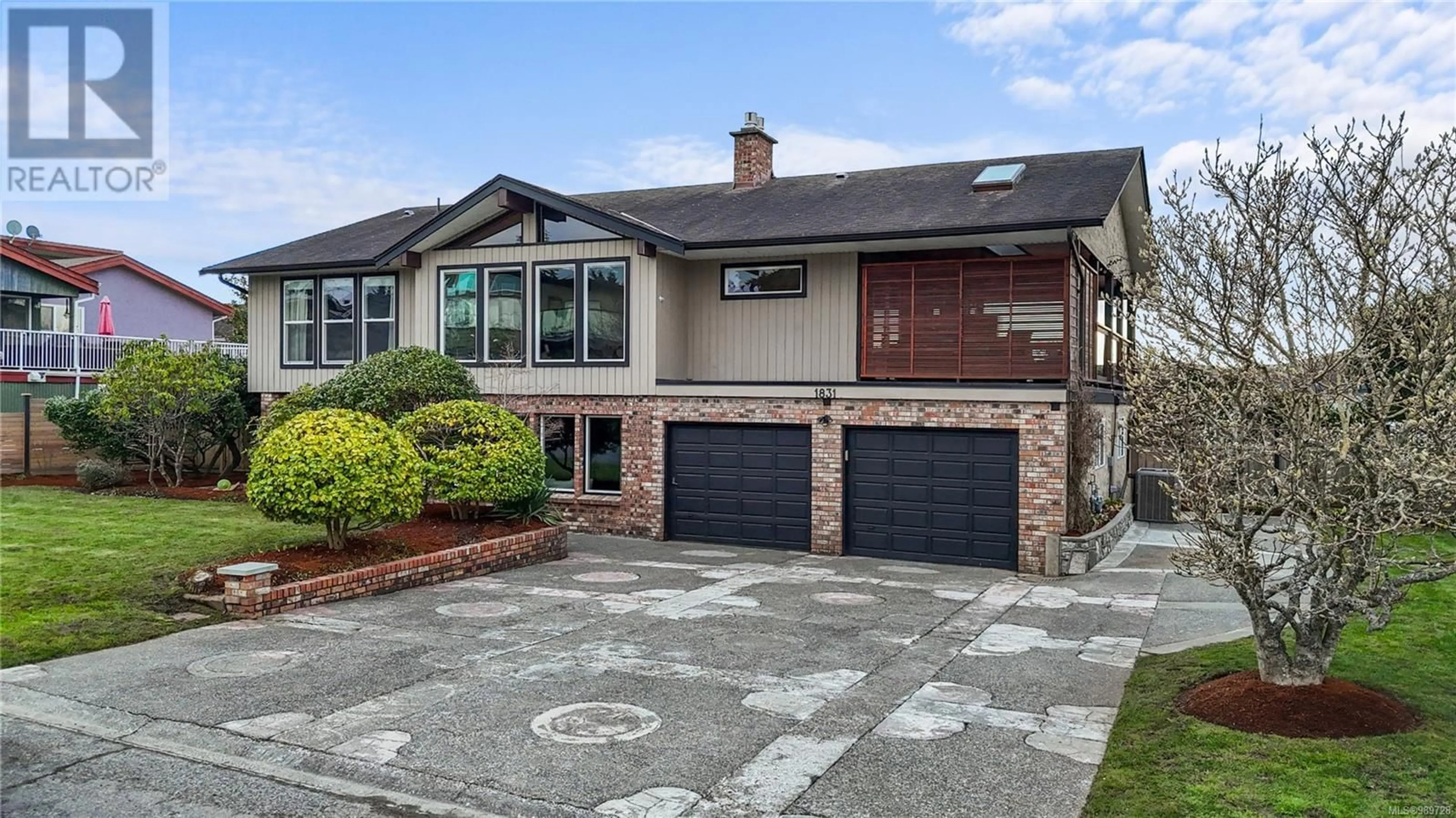 Home with brick exterior material, street for 1831 Merida Pl, Saanich British Columbia V8N5E1