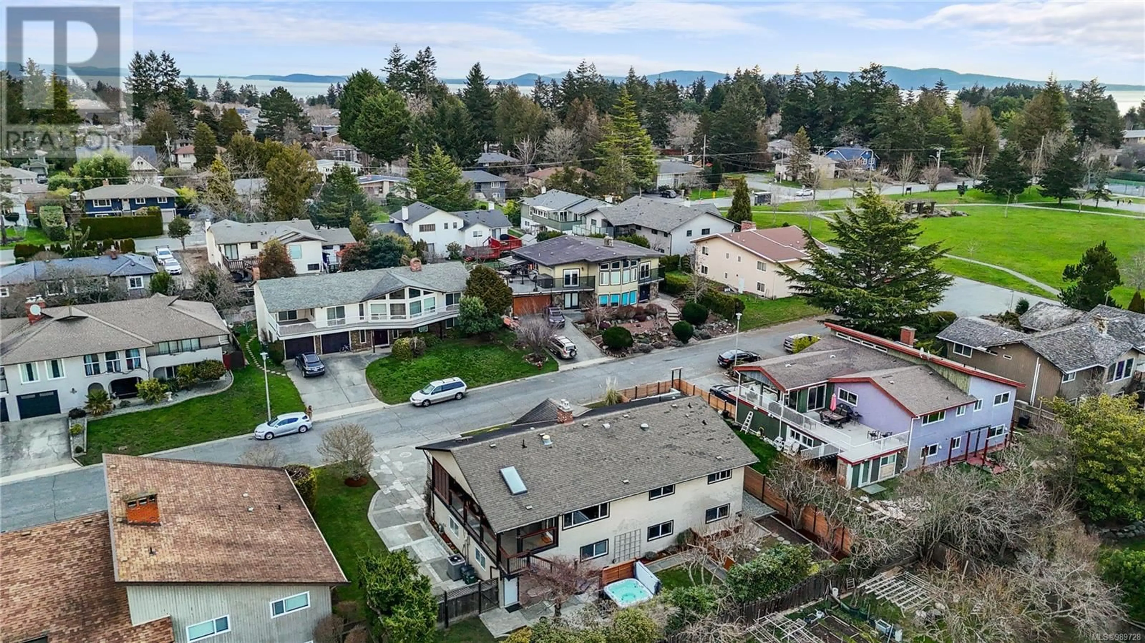 A pic from outside/outdoor area/front of a property/back of a property/a pic from drone, street for 1831 Merida Pl, Saanich British Columbia V8N5E1