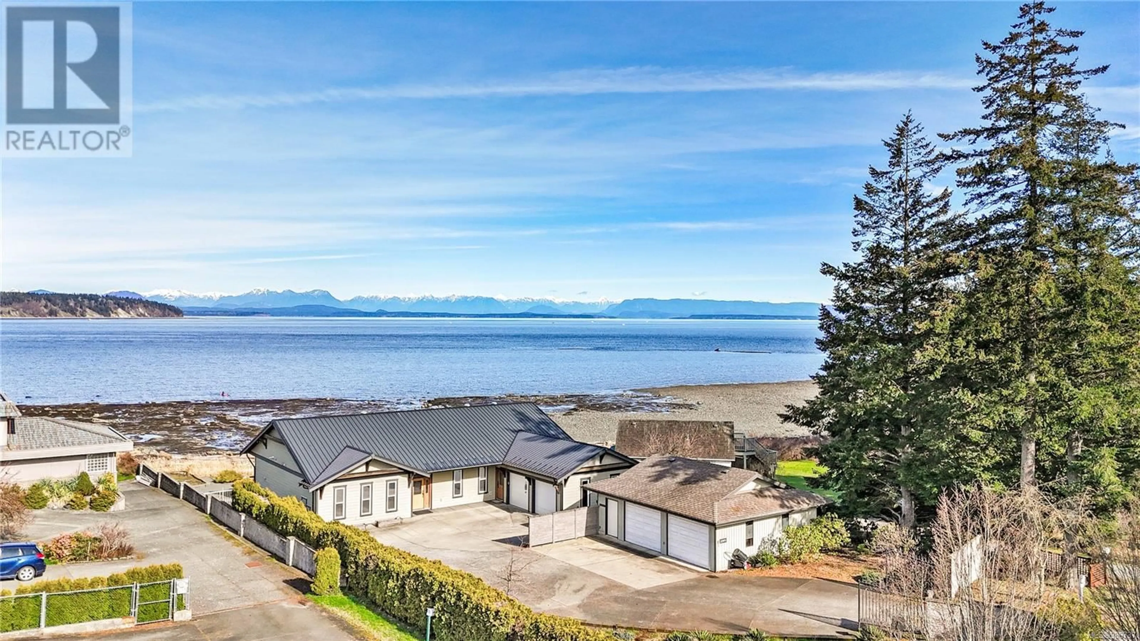 A pic from outside/outdoor area/front of a property/back of a property/a pic from drone, water/lake/river/ocean view for 2345 Island Hwy S, Campbell River British Columbia V9W1C4