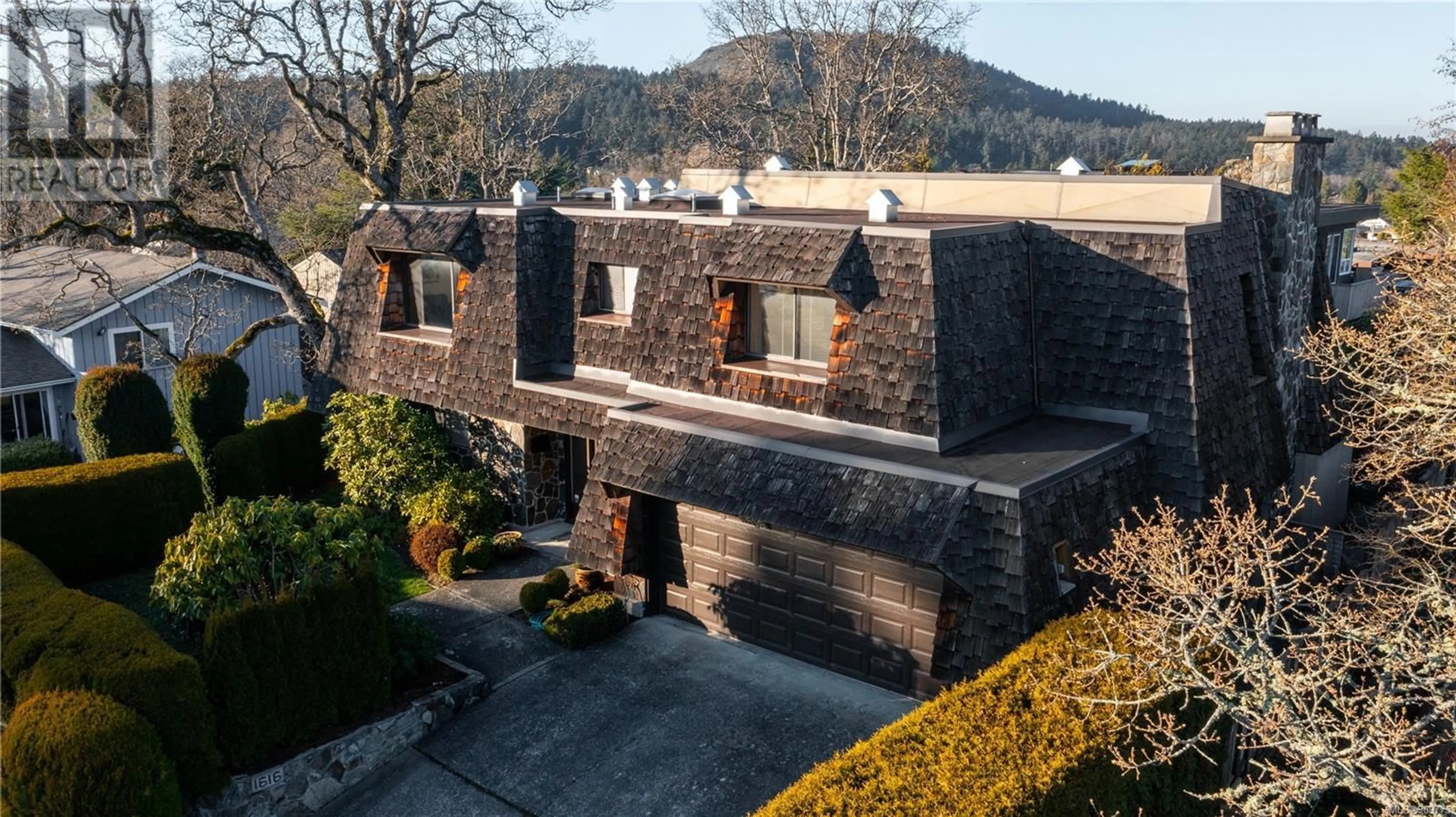 A pic from outside/outdoor area/front of a property/back of a property/a pic from drone, building for 1616 BARKSDALE DRIVE, Saanich British Columbia V8N4Z8
