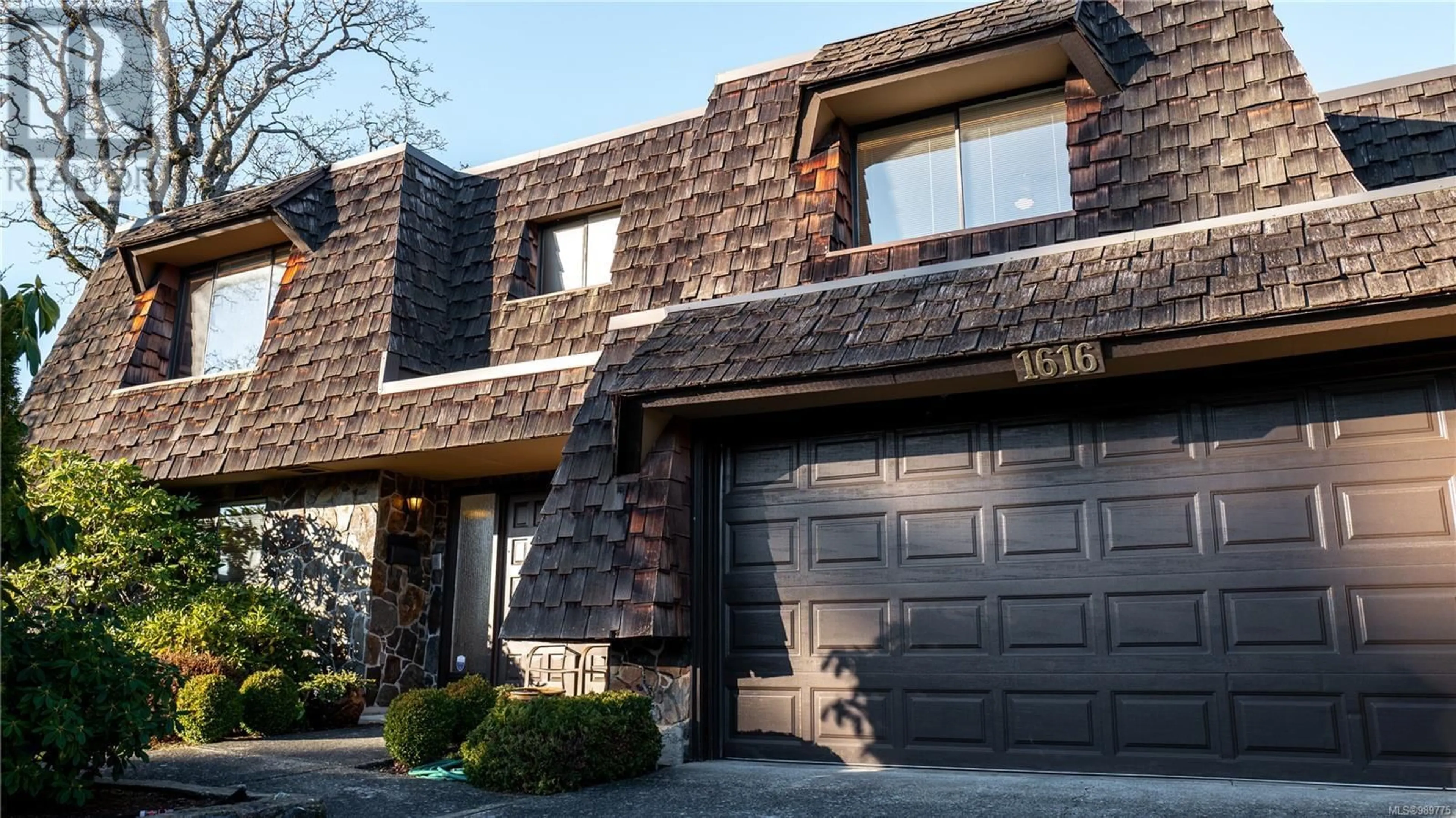 Home with brick exterior material, street for 1616 Barksdale Dr, Saanich British Columbia V8N4Z8