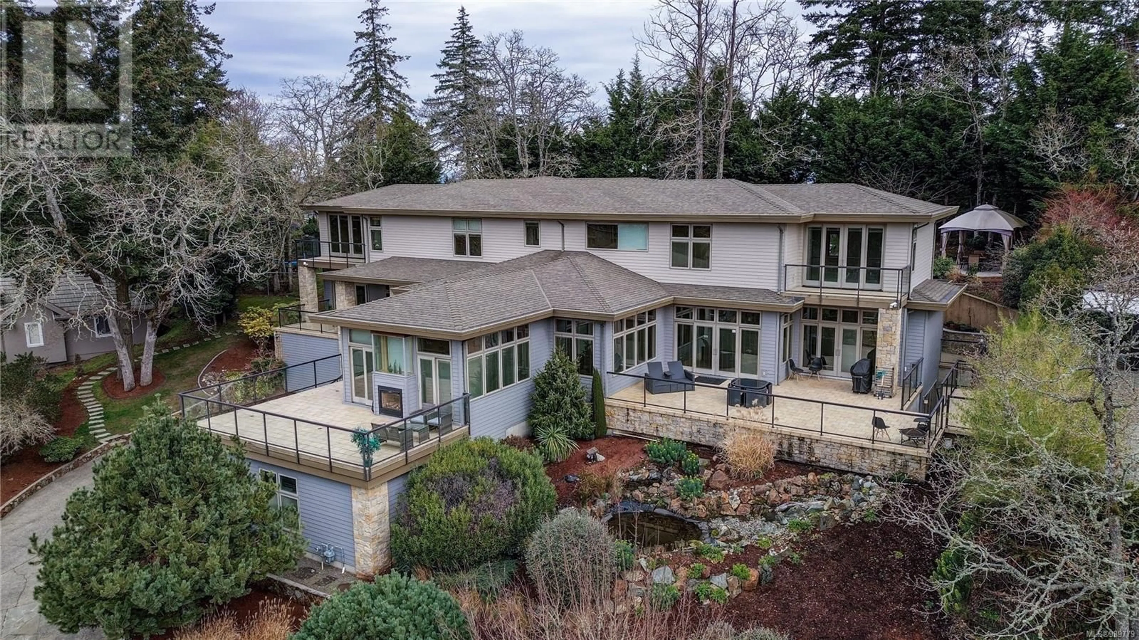 A pic from outside/outdoor area/front of a property/back of a property/a pic from drone, unknown for 908 COBBLESTONE LANE, Saanich British Columbia V8Y3G3