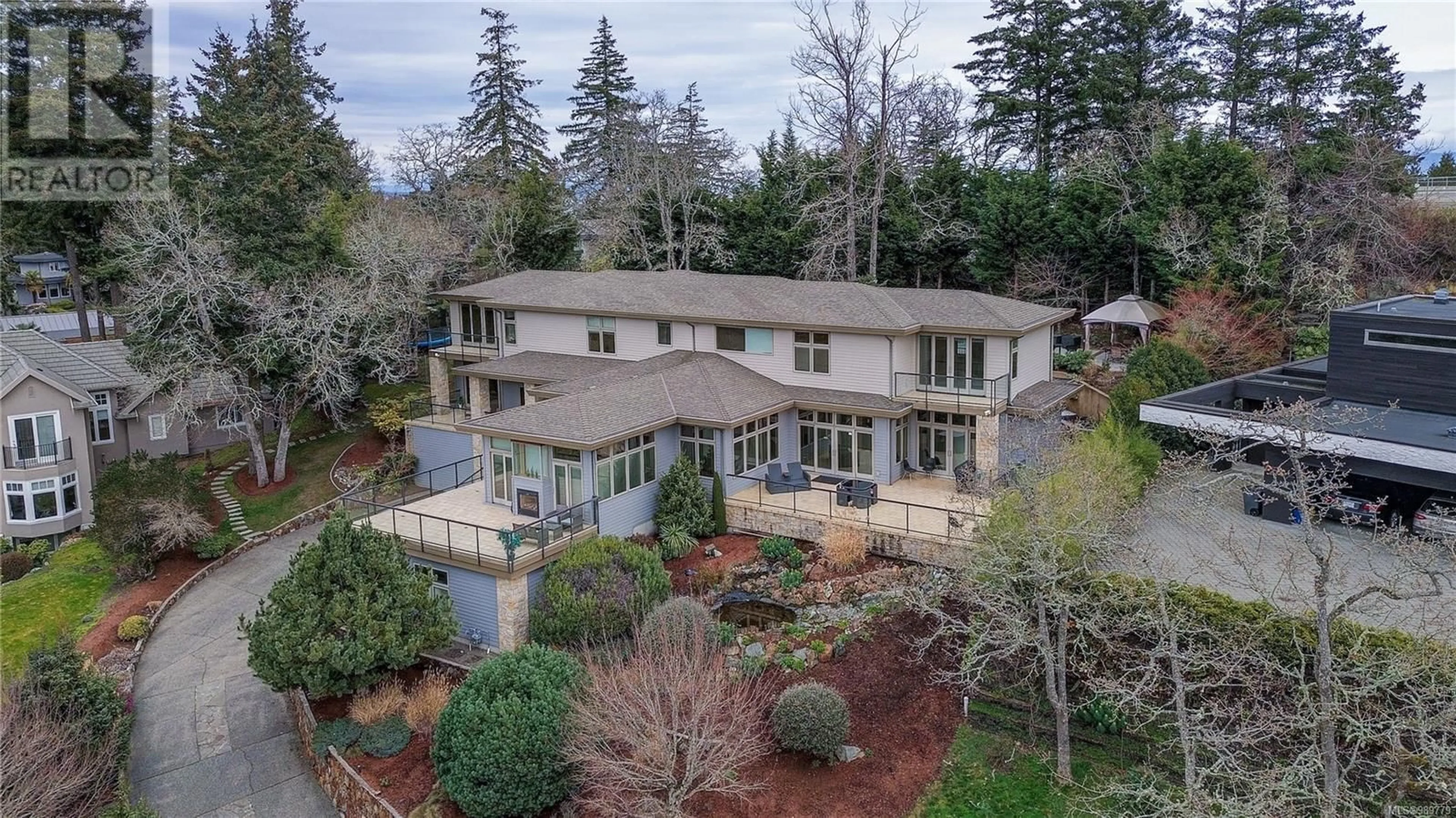 A pic from outside/outdoor area/front of a property/back of a property/a pic from drone, unknown for 908 COBBLESTONE LANE, Saanich British Columbia V8Y3G3