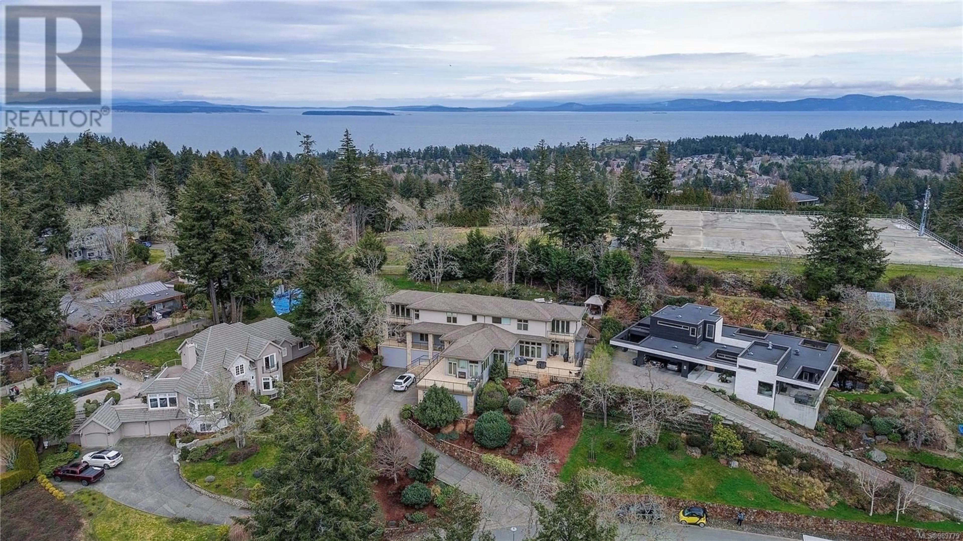 A pic from outside/outdoor area/front of a property/back of a property/a pic from drone, water/lake/river/ocean view for 908 Cobblestone Lane, Saanich British Columbia V8Y3G3