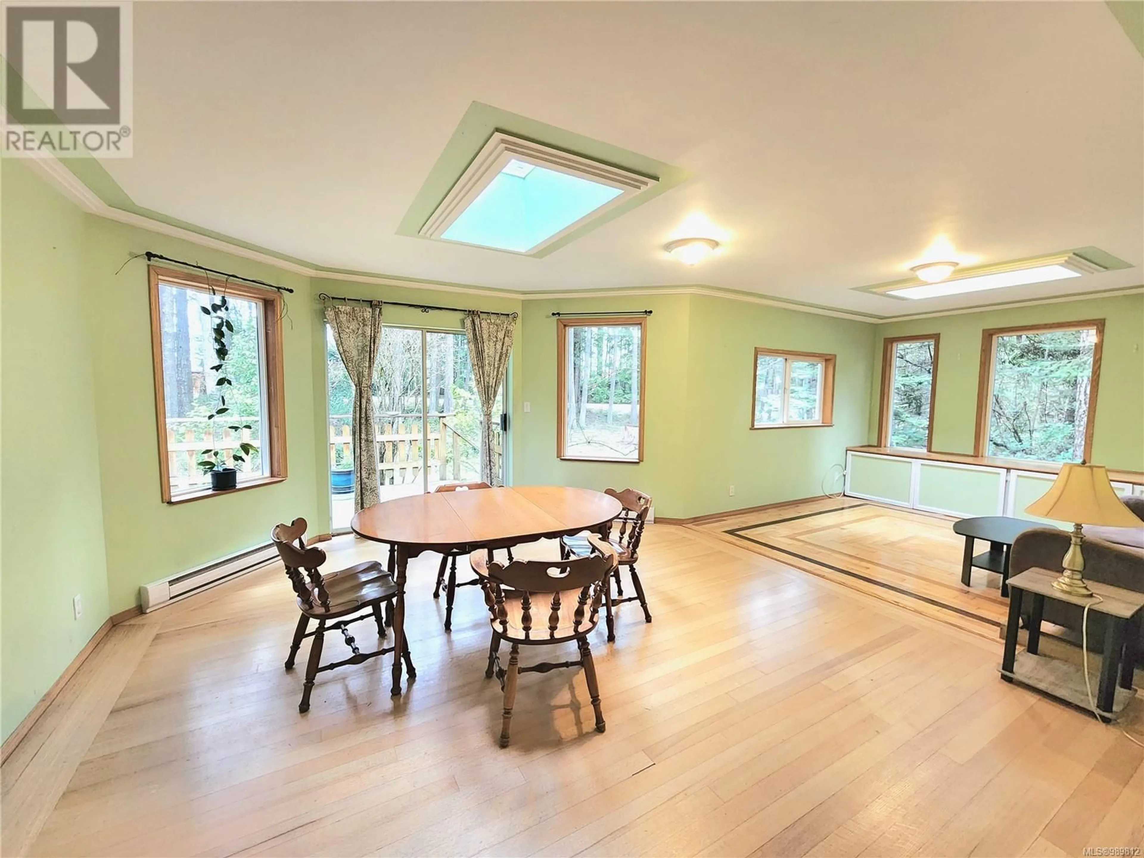 Dining room, wood/laminate floor for 1497 Violet Cres, Gabriola Island British Columbia V0R1X5