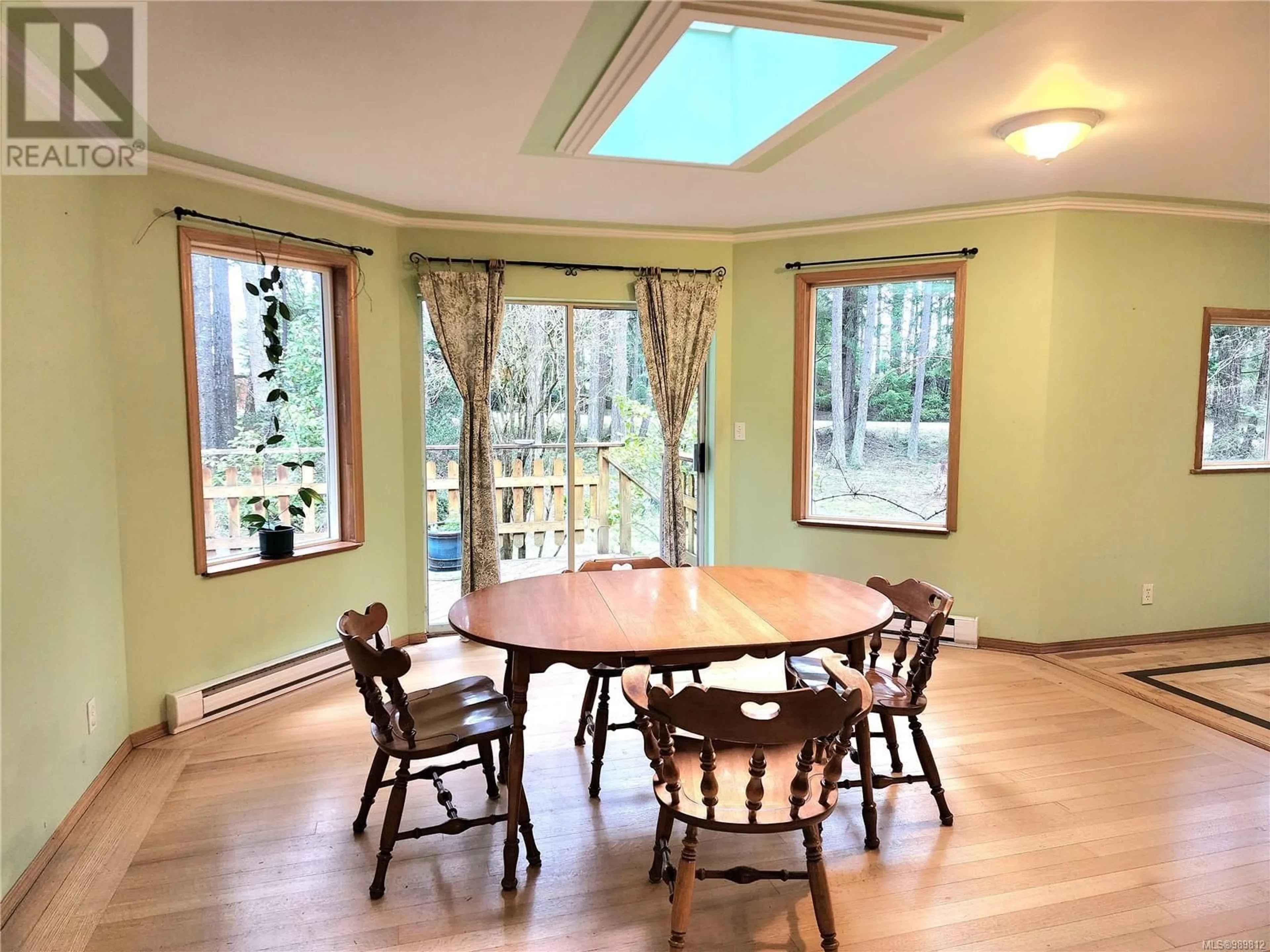 Dining room, wood/laminate floor for 1497 Violet Cres, Gabriola Island British Columbia V0R1X5