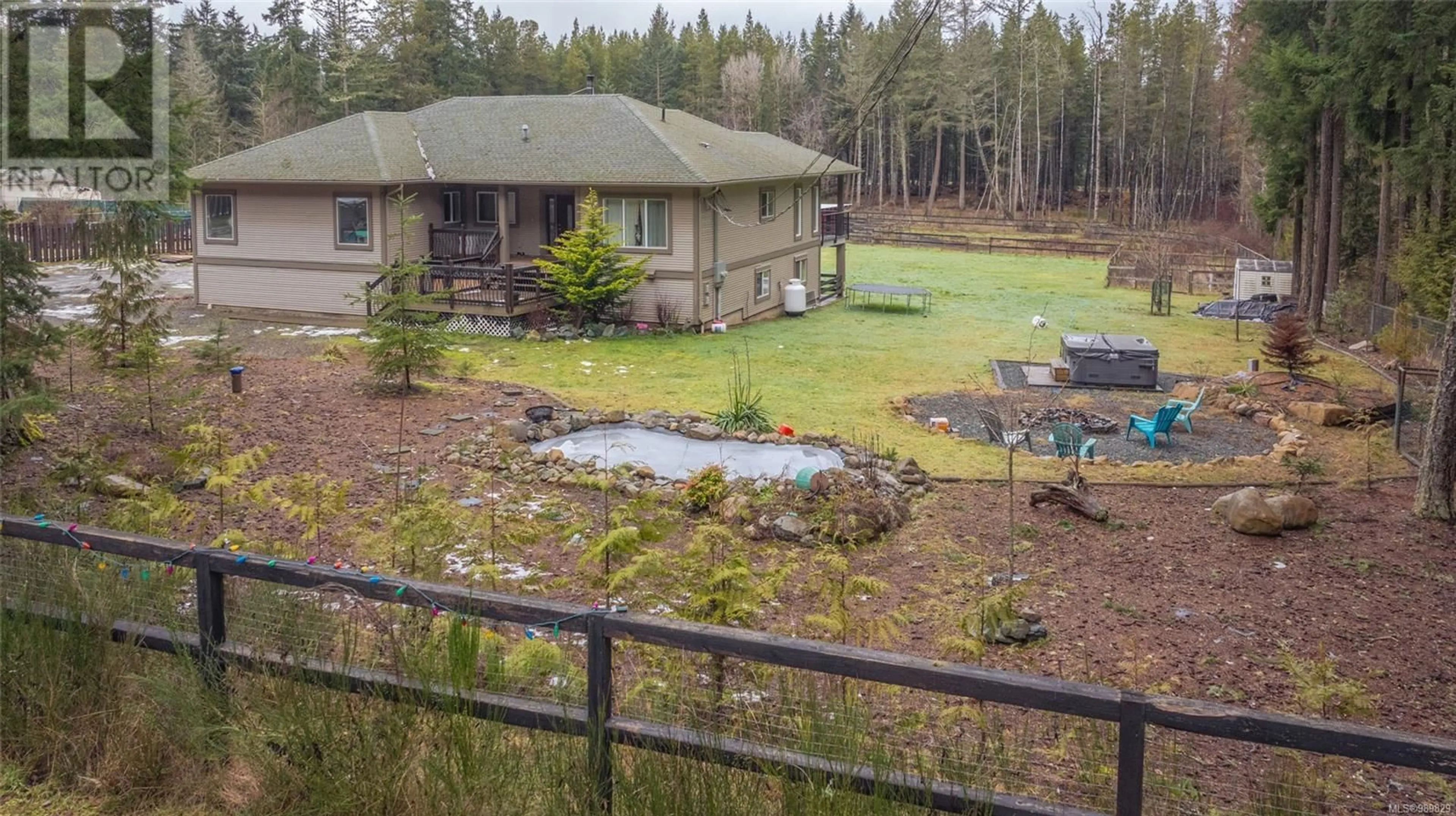 A pic from outside/outdoor area/front of a property/back of a property/a pic from drone, forest/trees view for 315 Allsbrook Rd, Errington British Columbia V9P2A8