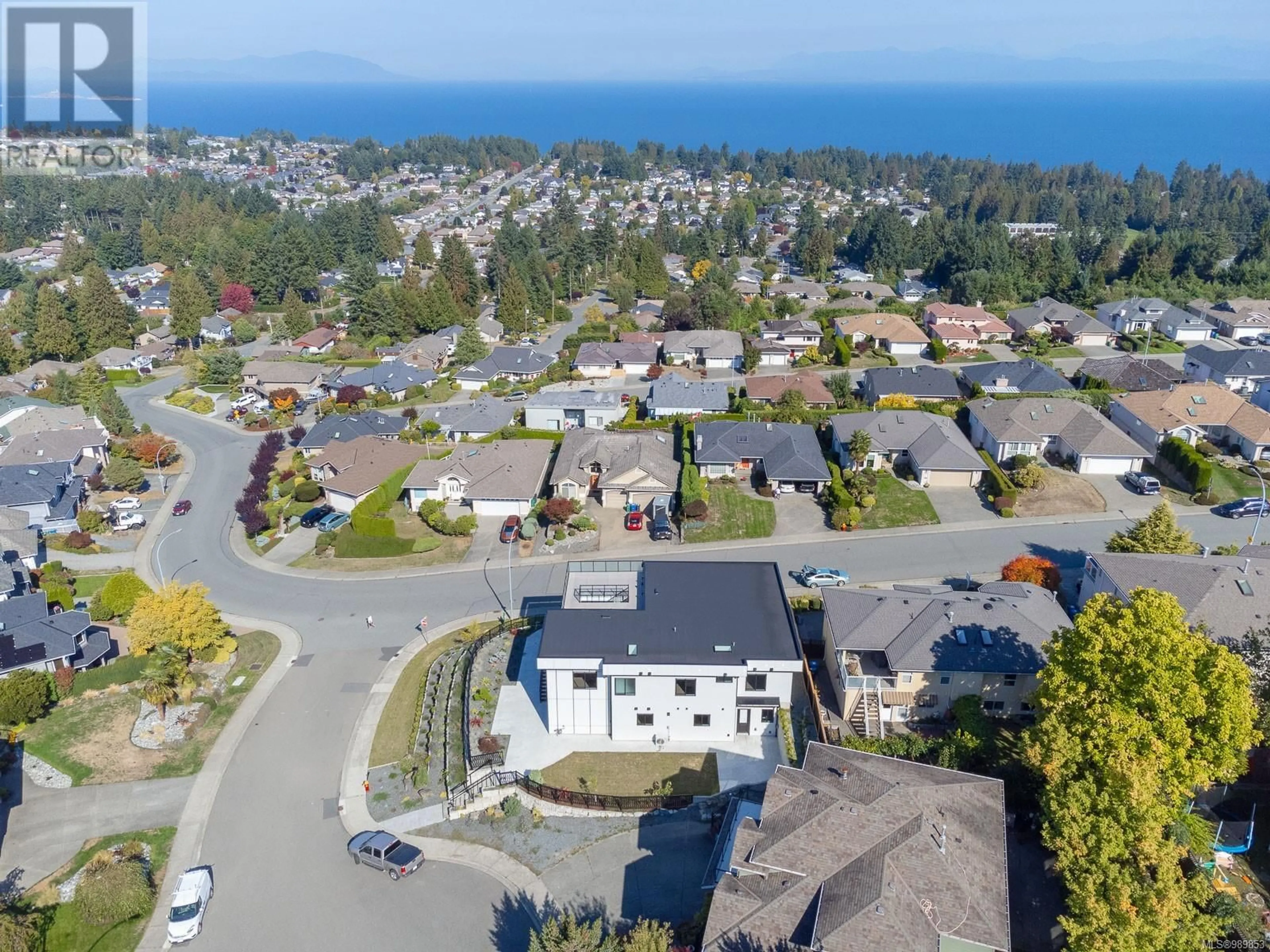 A pic from outside/outdoor area/front of a property/back of a property/a pic from drone, unknown for 5391 Kenwill Dr, Nanaimo British Columbia V9T5Z9