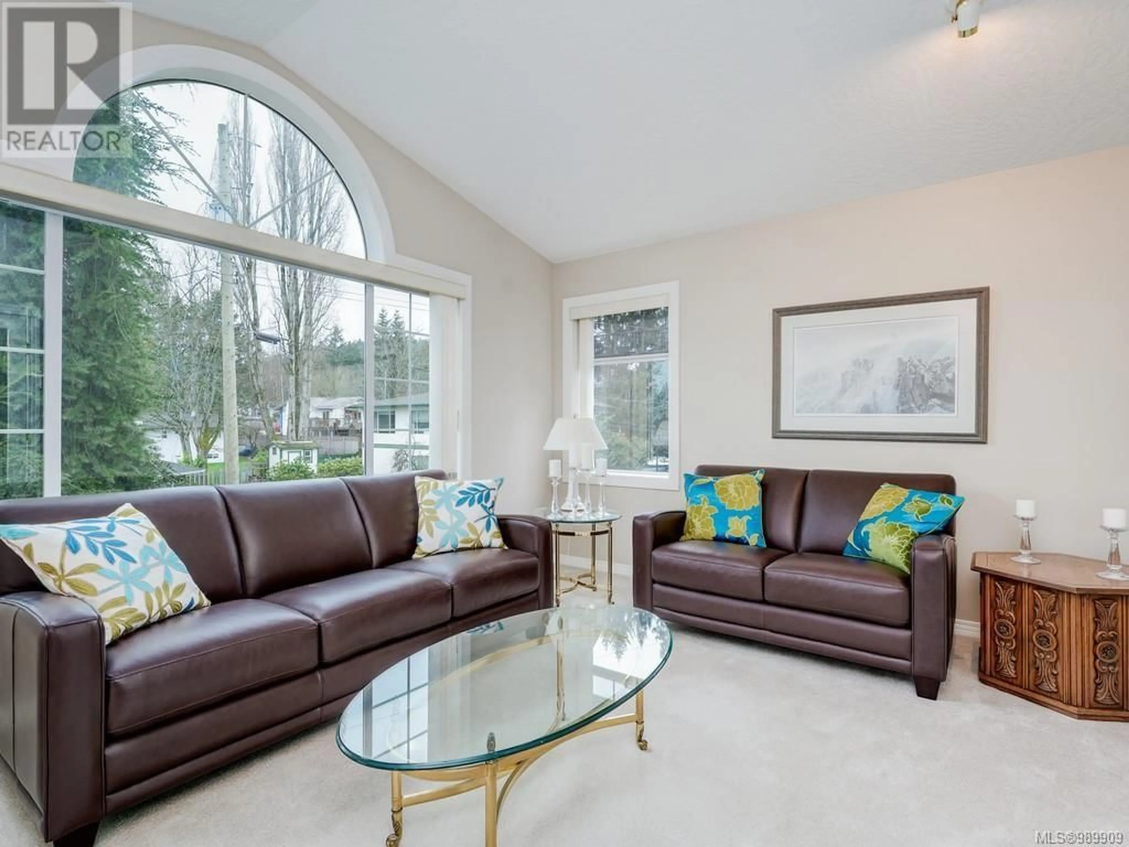 Living room with furniture, ceramic/tile floor for 6255 Springlea Rd, Central Saanich British Columbia V8Z5Z5