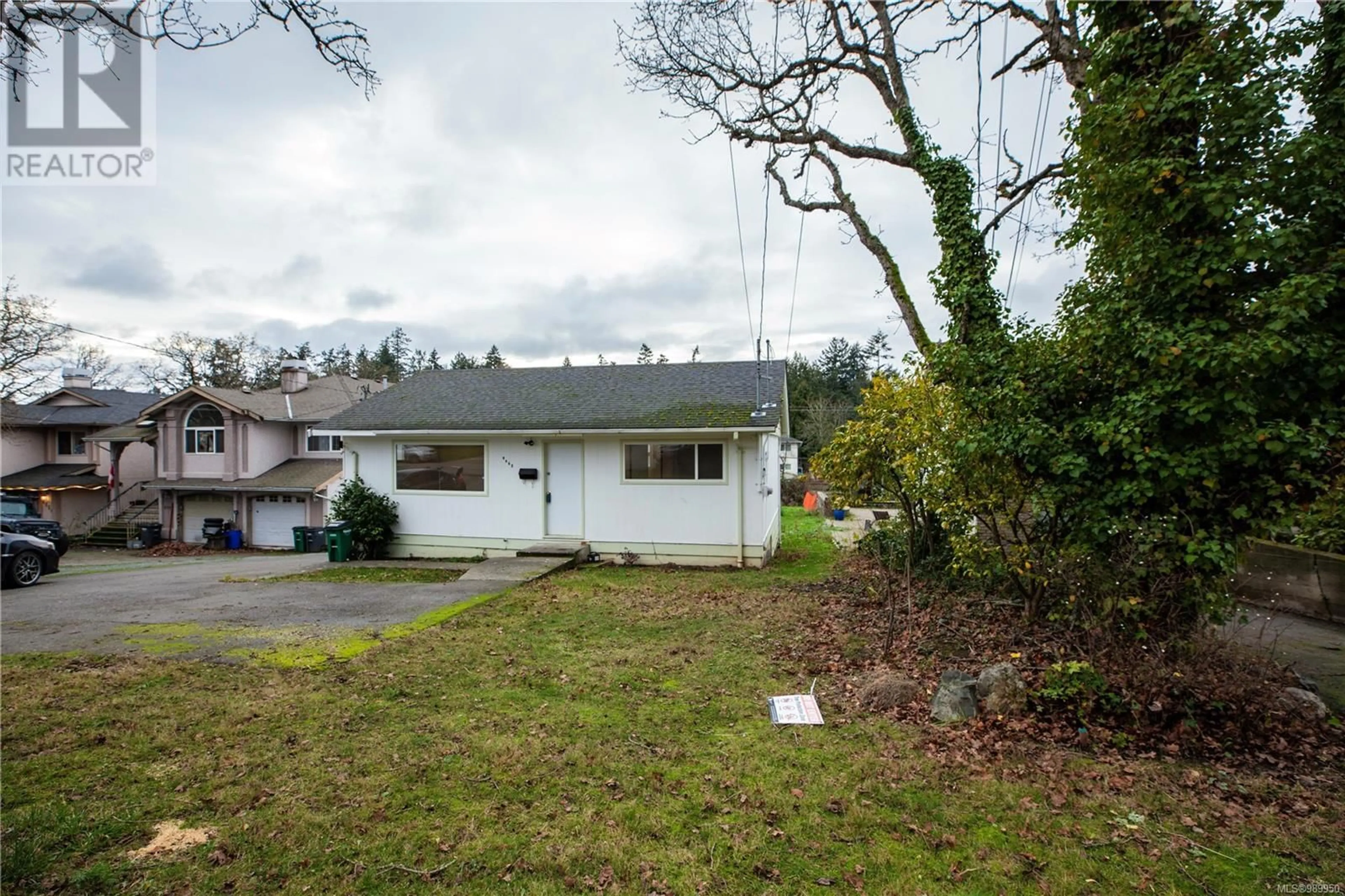 A pic from outside/outdoor area/front of a property/back of a property/a pic from drone, street for 4068 Grange Rd, Saanich British Columbia V8Z4V5