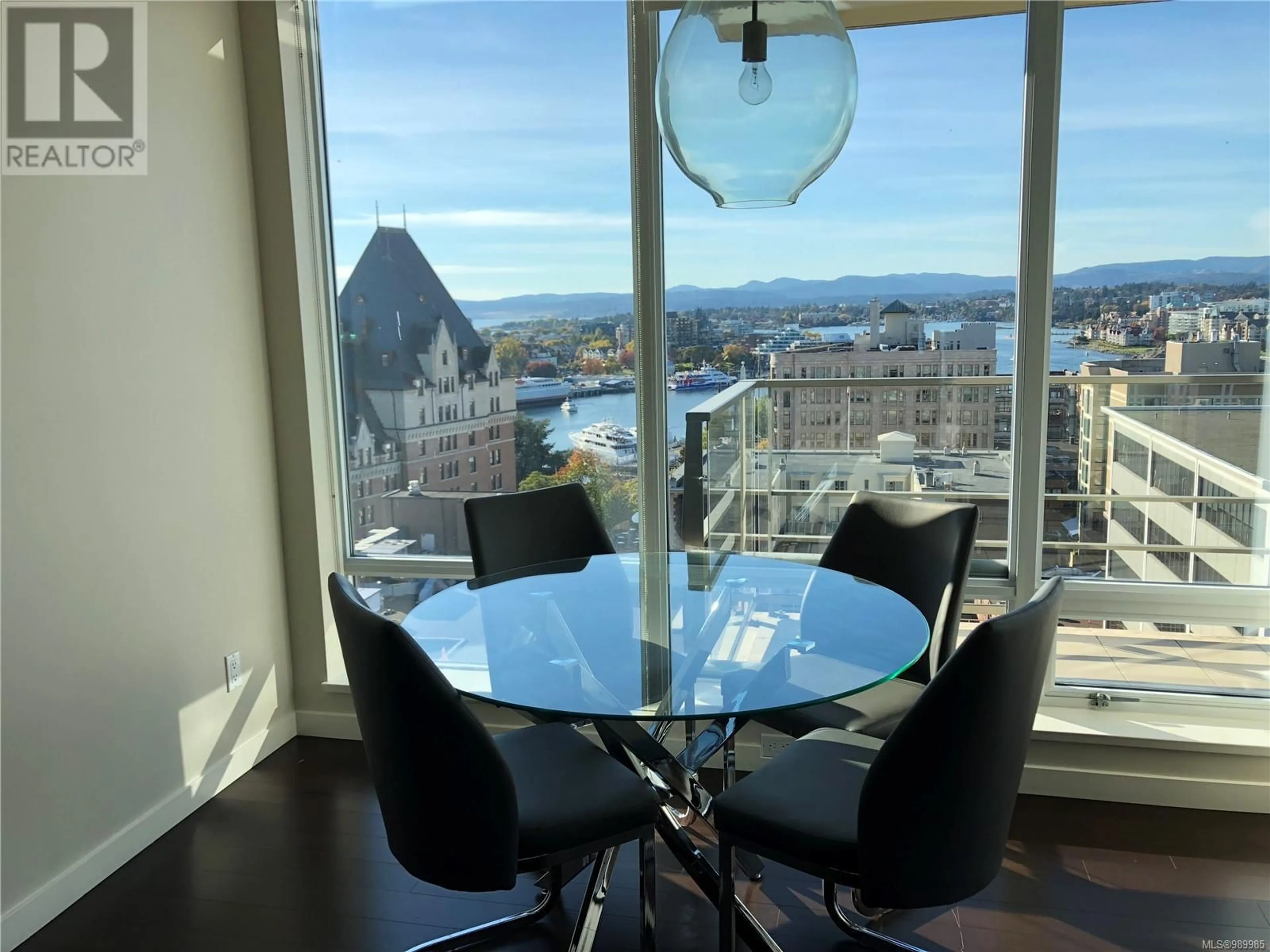 Dining room, wood/laminate floor for 1405 707 Courtney St, Victoria British Columbia V8W0A9