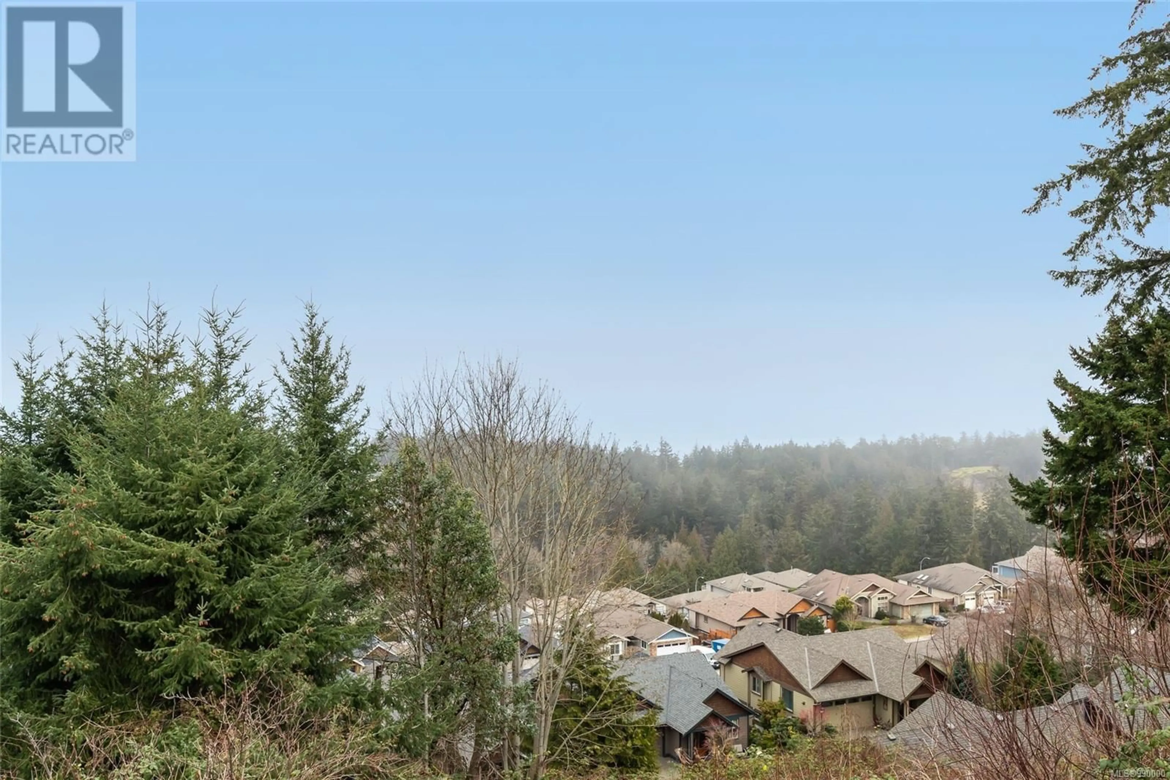 A pic from outside/outdoor area/front of a property/back of a property/a pic from drone, forest/trees view for 4718 LAGUNA WAY, Nanaimo British Columbia V9T5C3