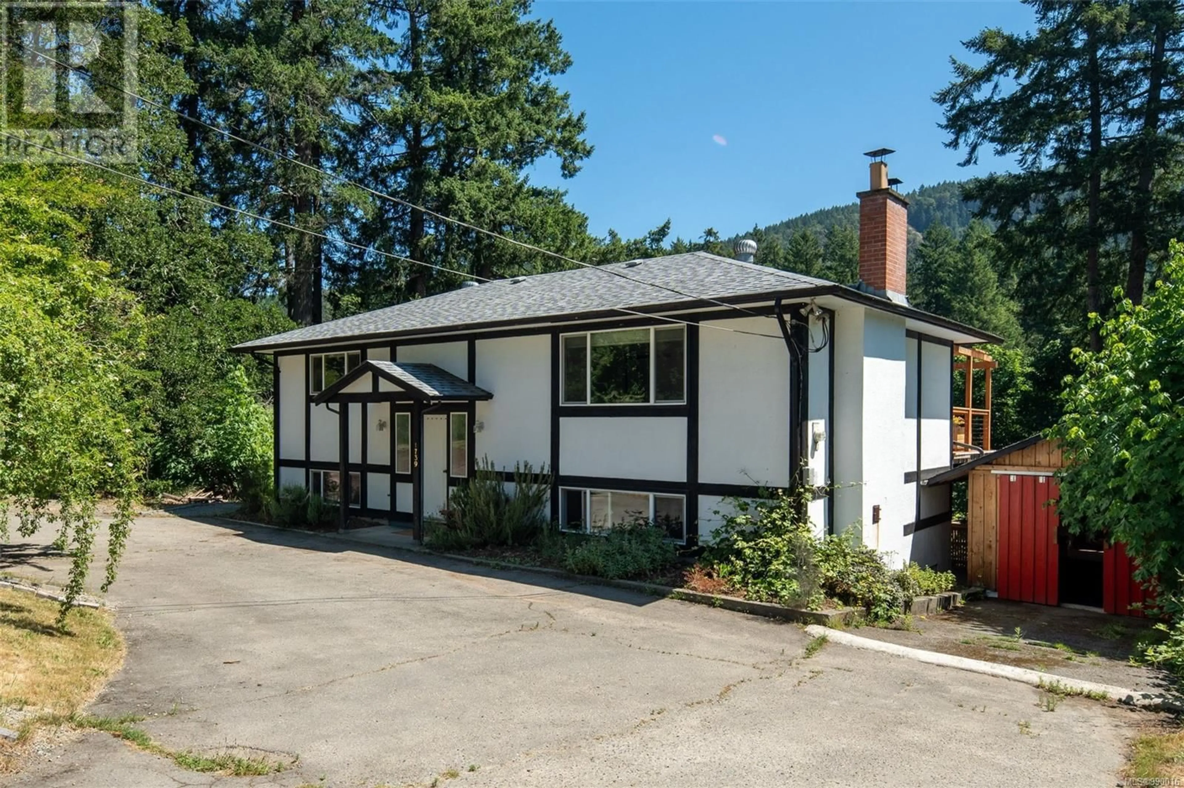 Home with vinyl exterior material, mountain view for 1739 Tzouhalem Rd, Duncan British Columbia V9L5L6