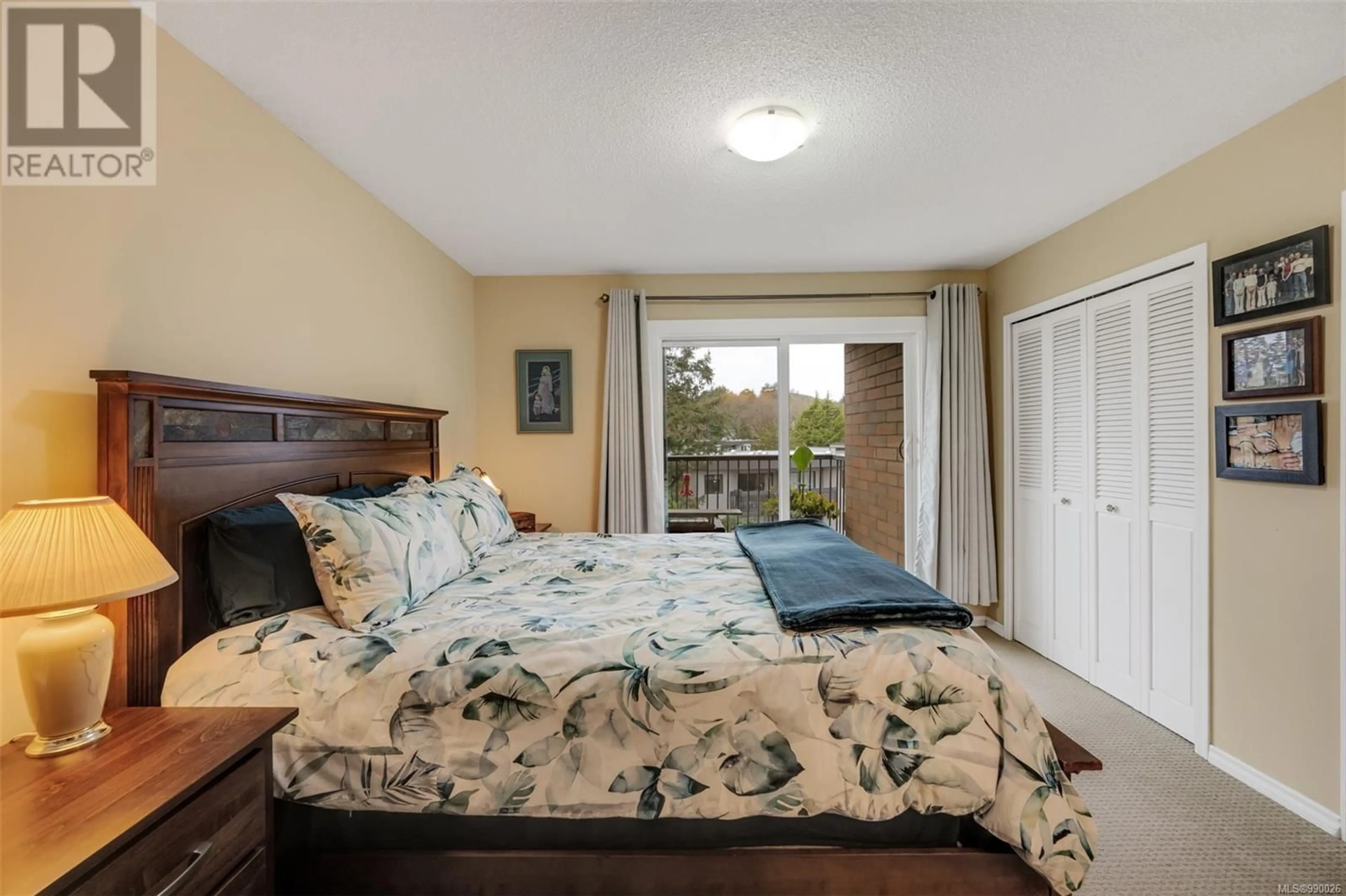 Bedroom with bed, unknown for 505 4030 Quadra St, Saanich British Columbia V8X1K2