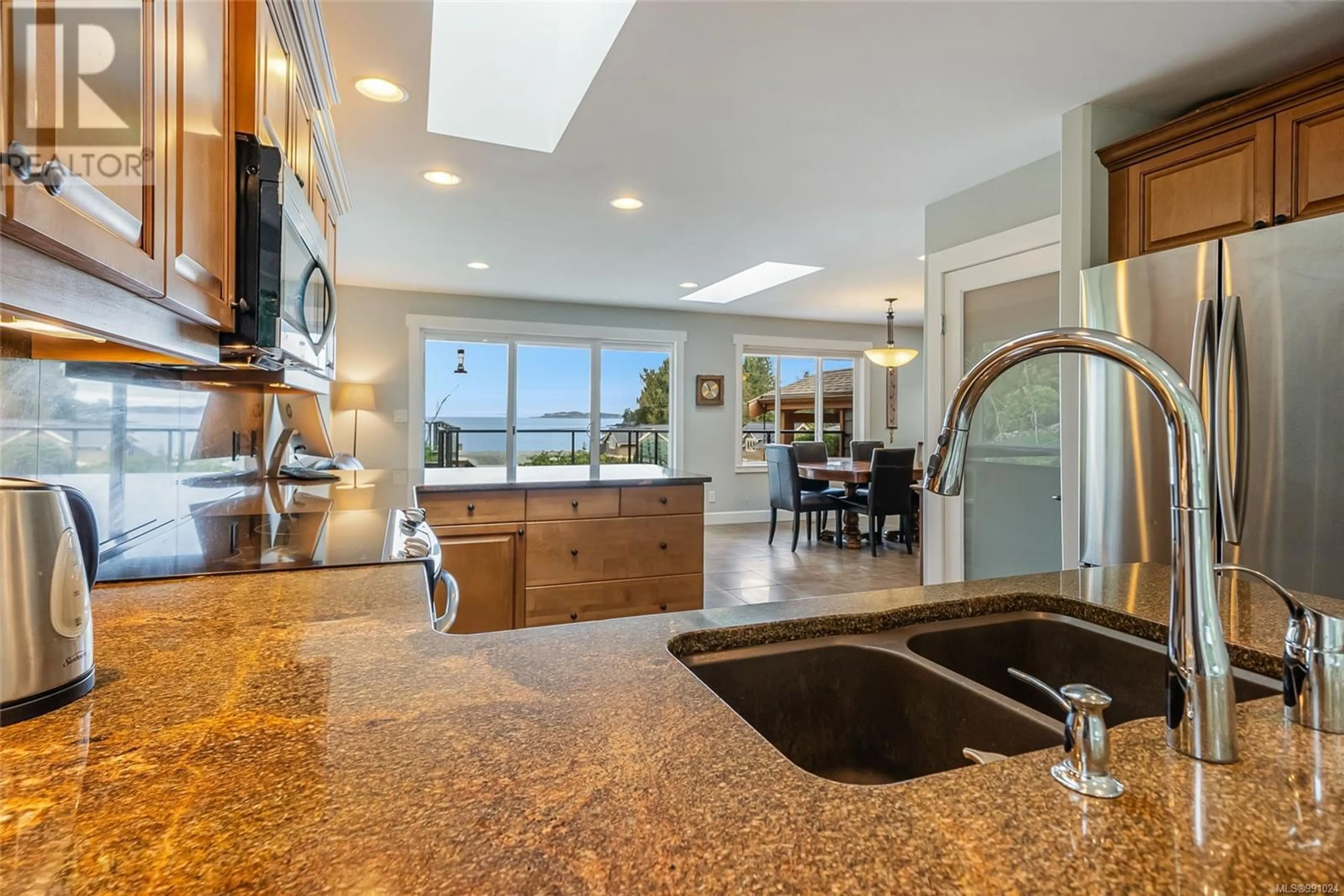 Open concept kitchen, ceramic/tile floor for 1567 Haida Way, Nanoose Bay British Columbia V9P9B5