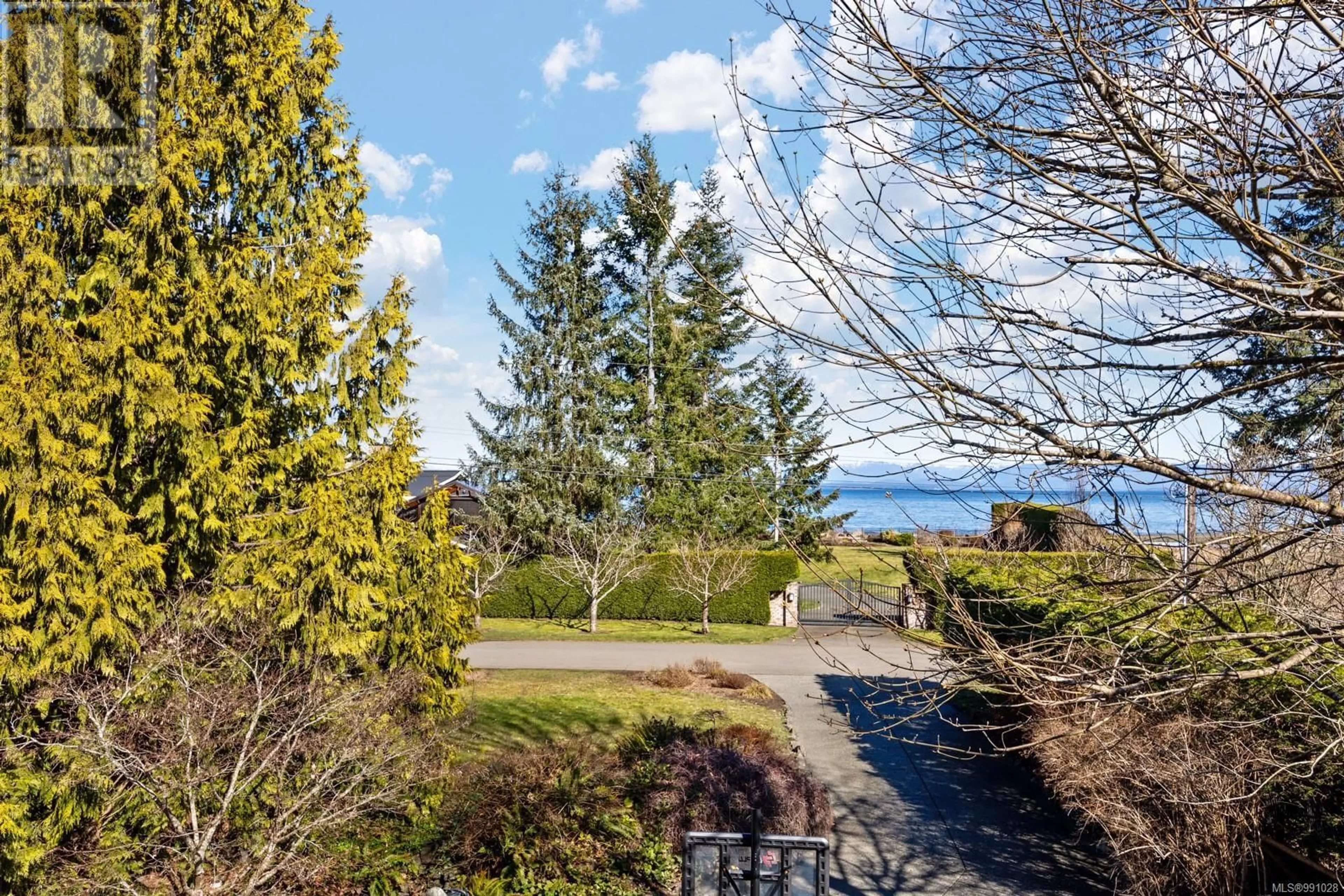 A pic from outside/outdoor area/front of a property/back of a property/a pic from drone, water/lake/river/ocean view for 8839 DRIFTWOOD Rd, Black Creek British Columbia V9J1A8