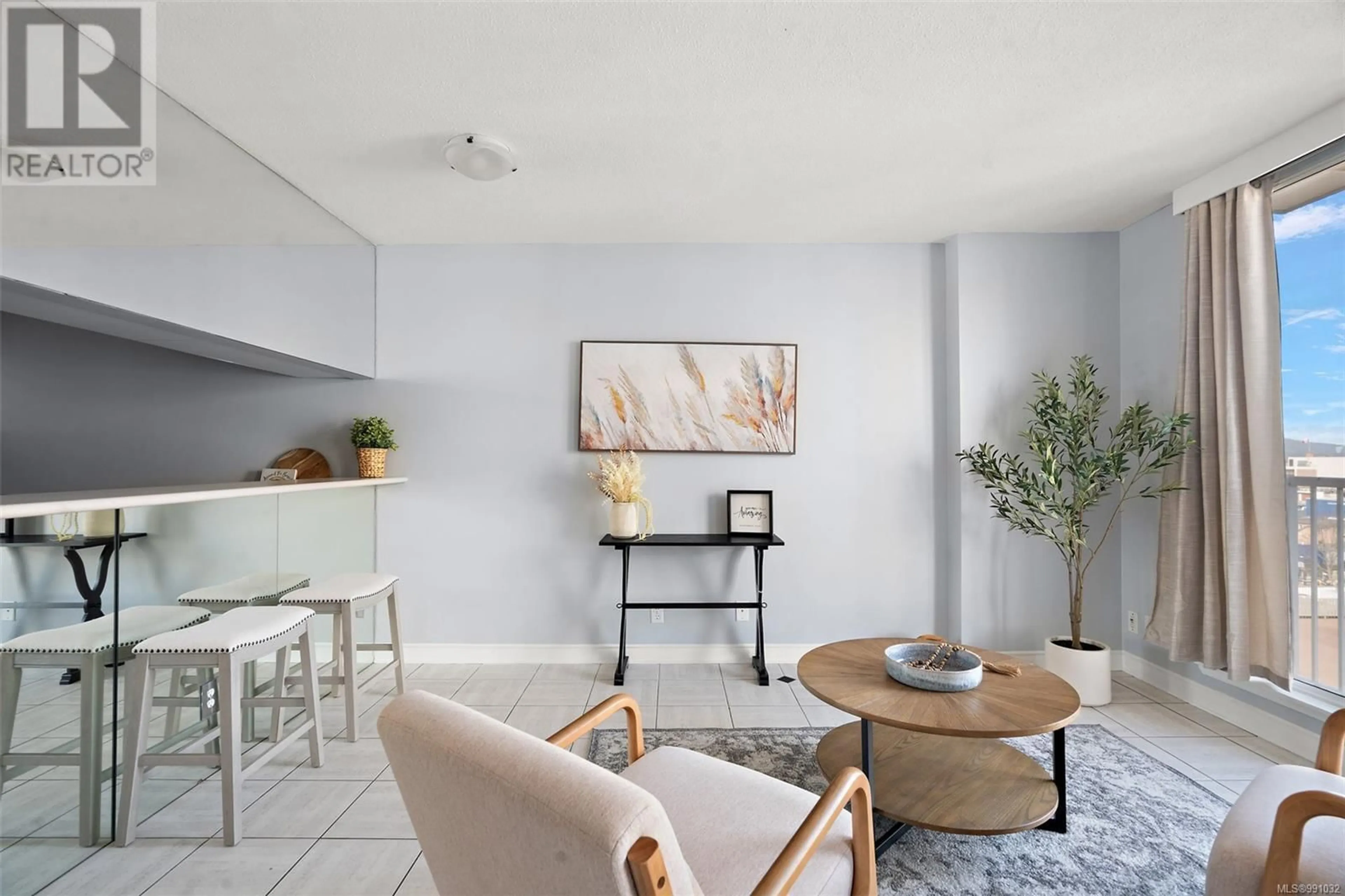 Living room with furniture, ceramic/tile floor for 1009 835 View St, Victoria British Columbia V8W3W8