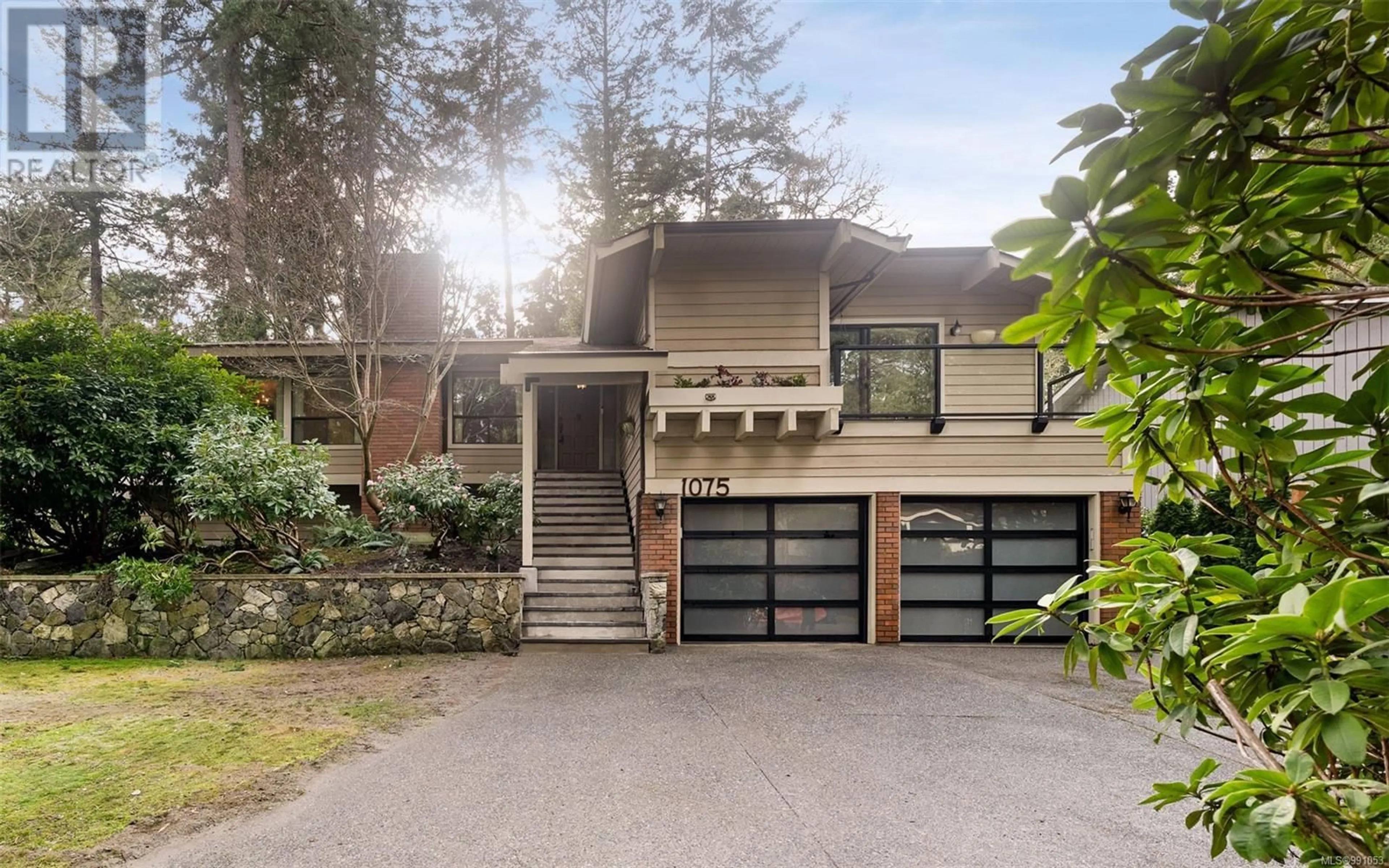 Home with brick exterior material, street for 1075 Quailwood Pl, Saanich British Columbia V8X4P7