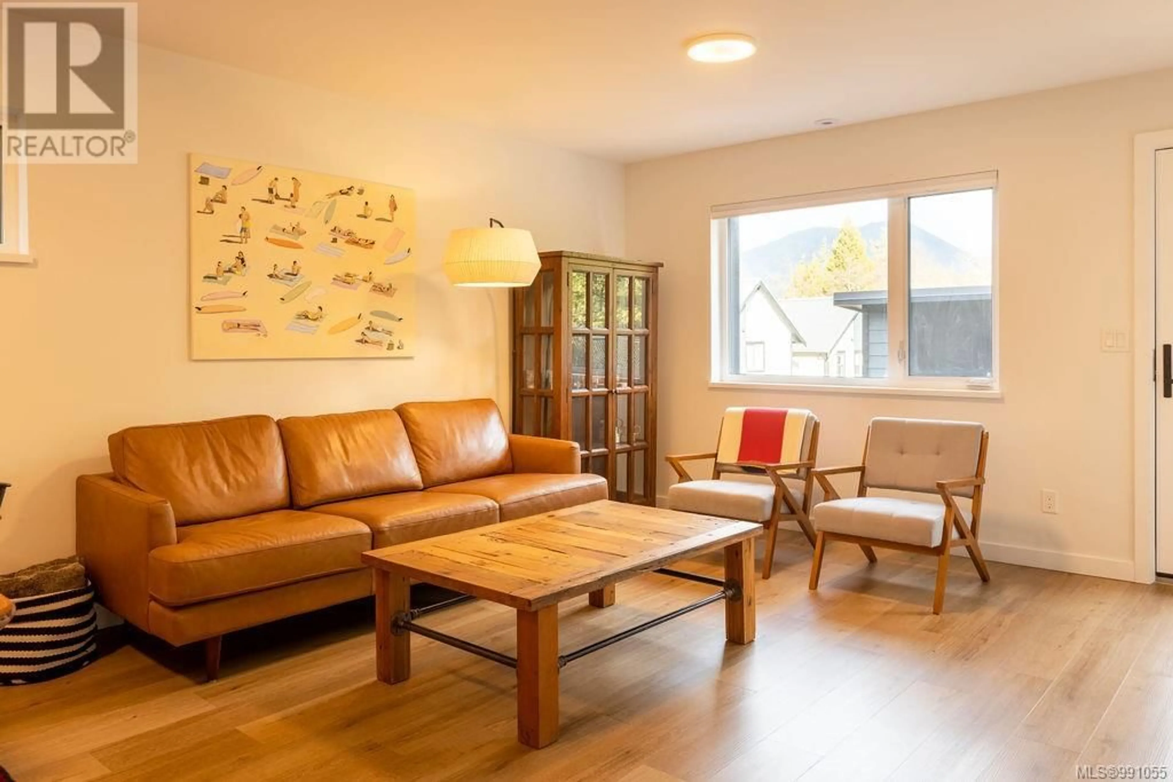 Living room with furniture, wood/laminate floor for 8 1782 St. Jacques Blvd, Ucluelet British Columbia V0R3A0