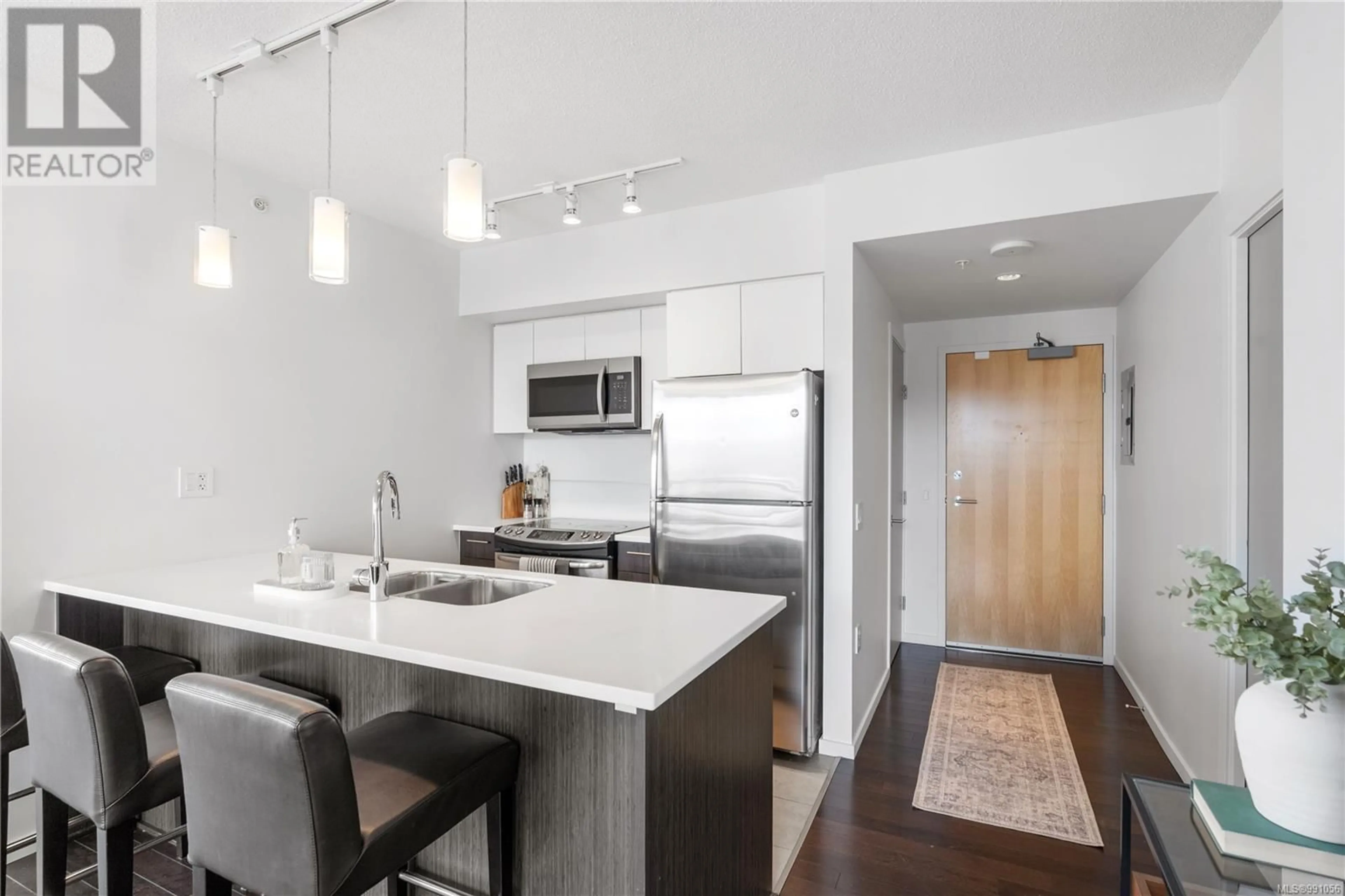 Open concept kitchen, unknown for 803 834 Johnson St, Victoria British Columbia V8W1N3