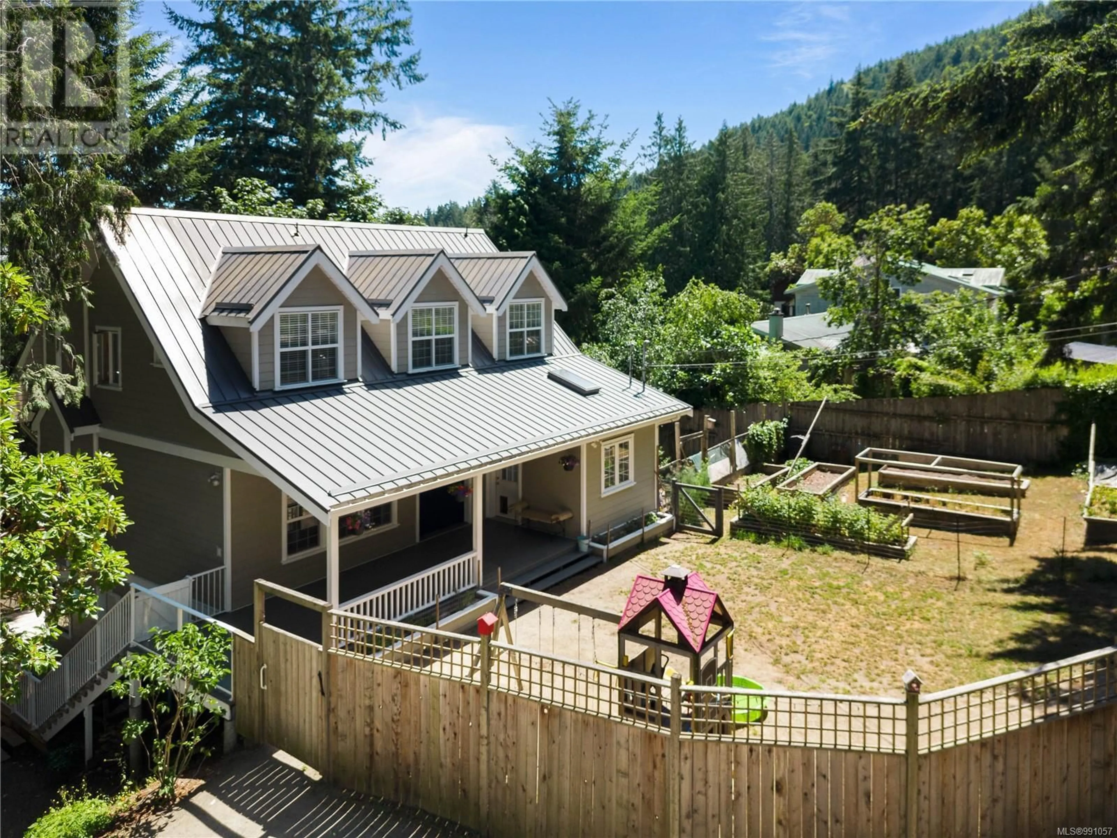 A pic from outside/outdoor area/front of a property/back of a property/a pic from drone, mountain view for 121 Pallot Way, Salt Spring British Columbia V8K2M5