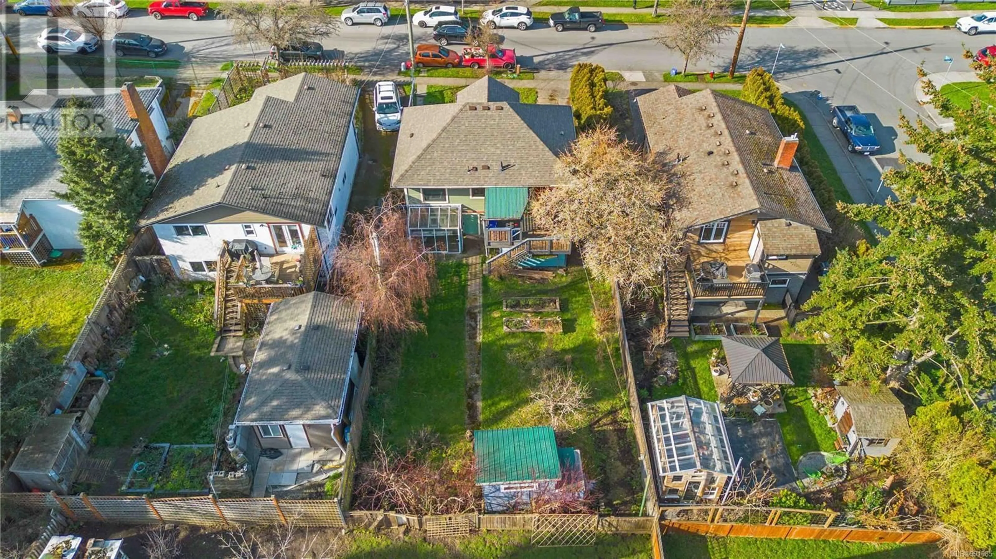 A pic from outside/outdoor area/front of a property/back of a property/a pic from drone, street for 1535 Myrtle Ave, Victoria British Columbia V8R2Z7