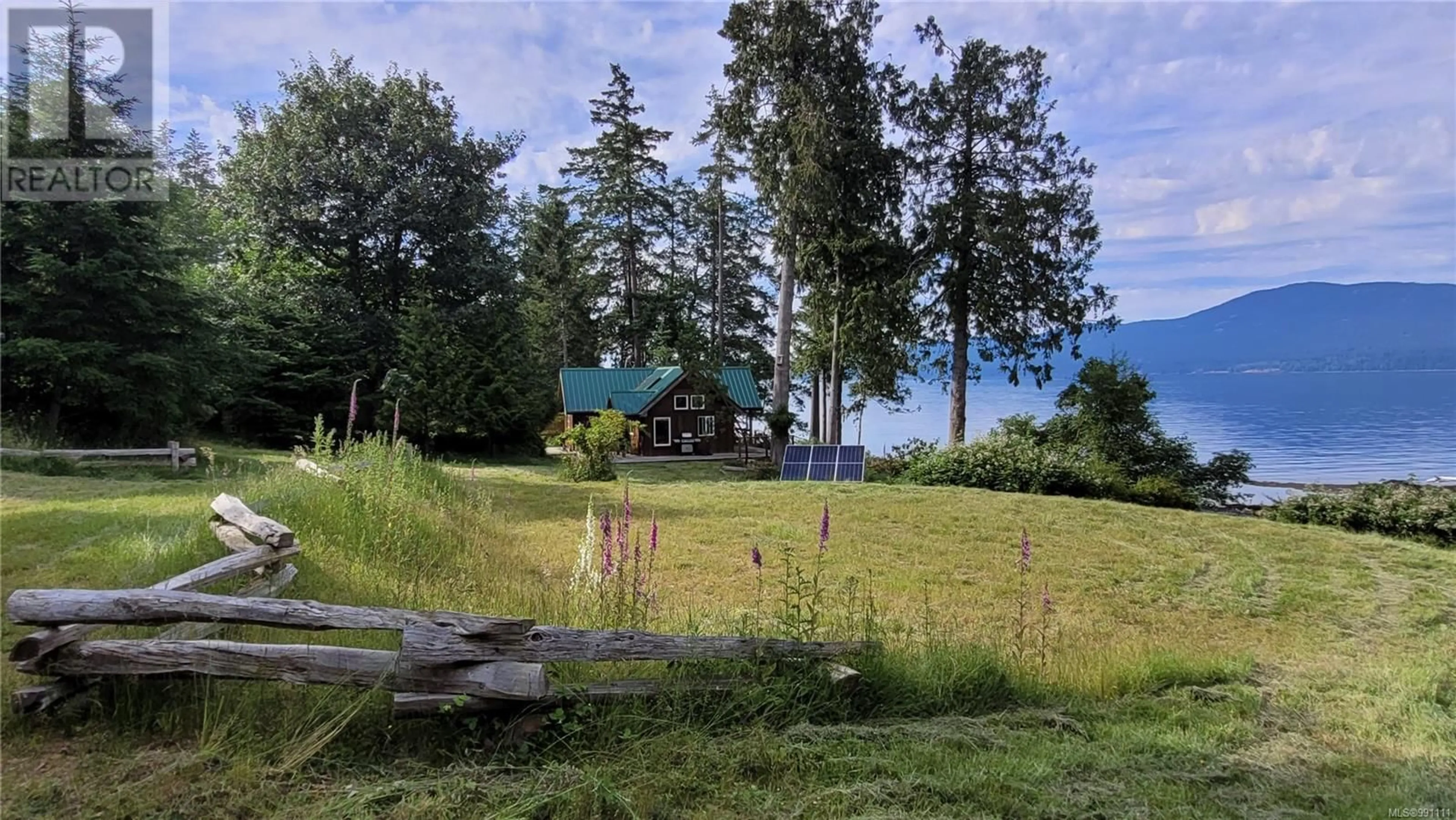 A pic from outside/outdoor area/front of a property/back of a property/a pic from drone, mountain view for 15 SPRING BAY ROAD, Lasqueti Island British Columbia V0R2J0