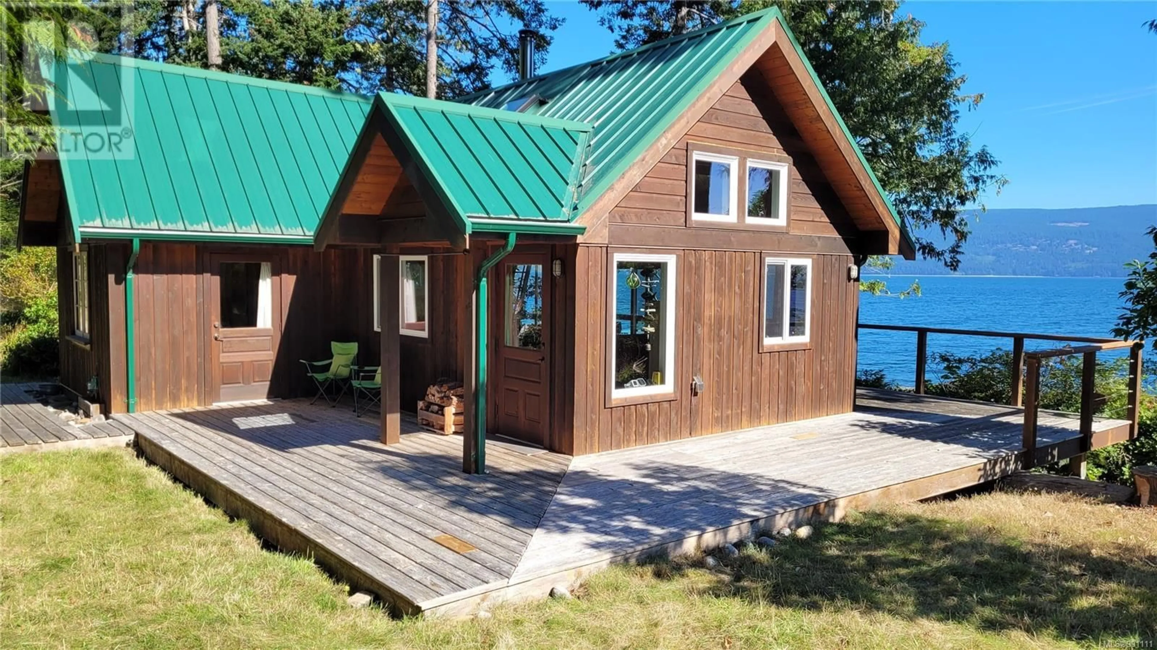 Home with vinyl exterior material, water/lake/river/ocean view for 15 SPRING BAY ROAD, Lasqueti Island British Columbia V0R2J0