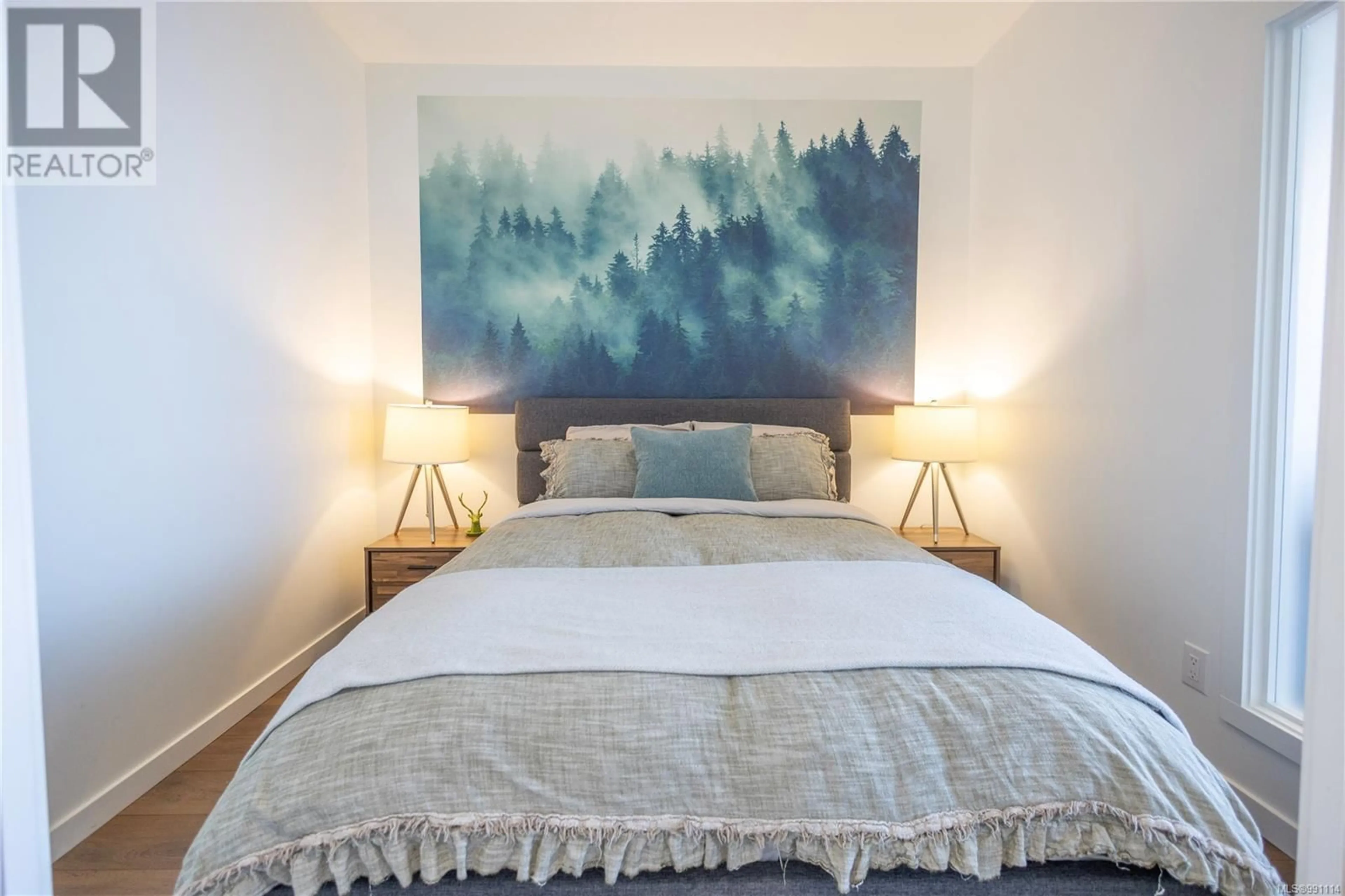 Bedroom with bed, wood/laminate floor for 504 517 Fisgard St, Victoria British Columbia V8W0C5