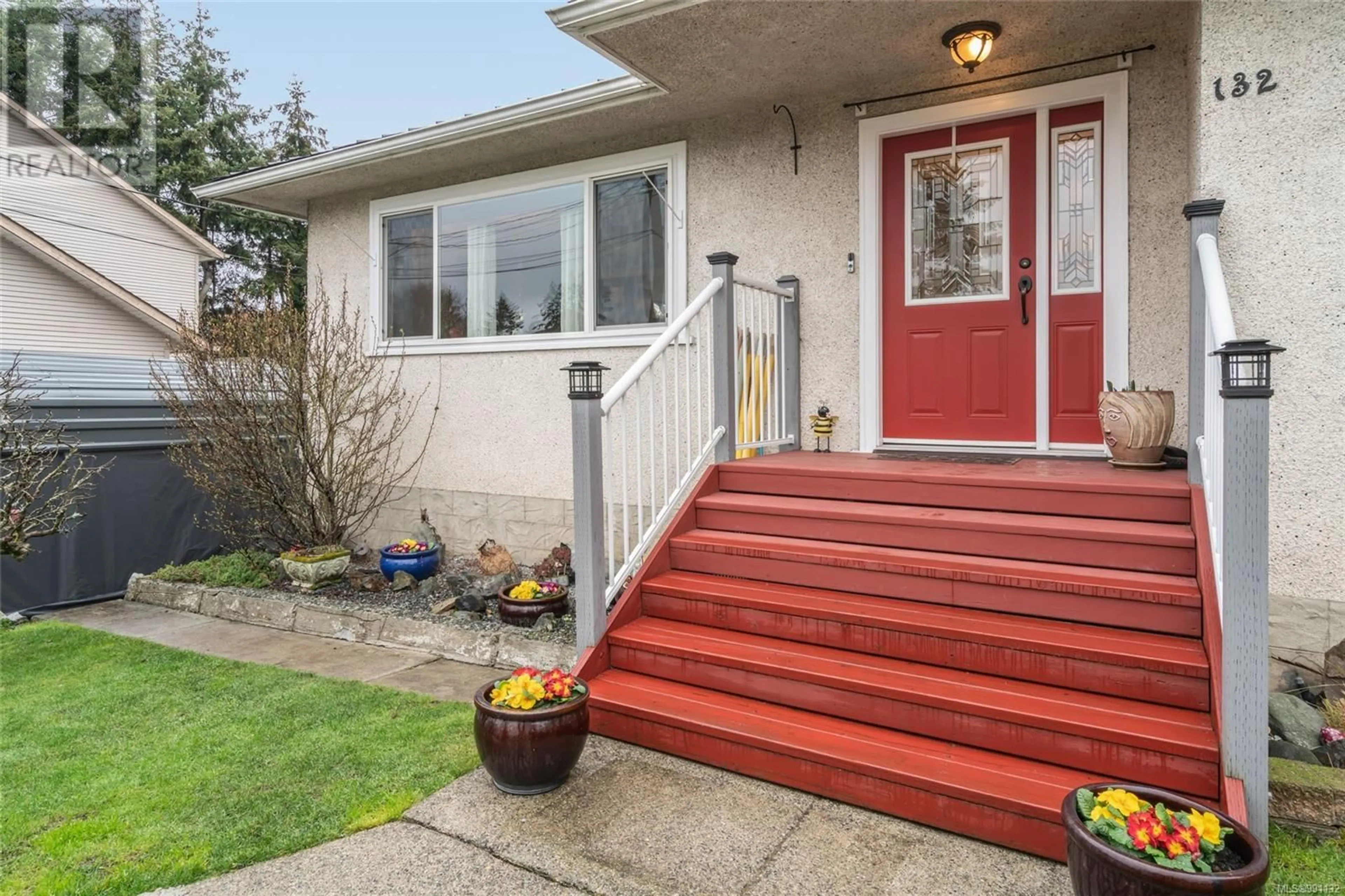 Home with vinyl exterior material, street for 132 Strickland St, Nanaimo British Columbia V9R4S2