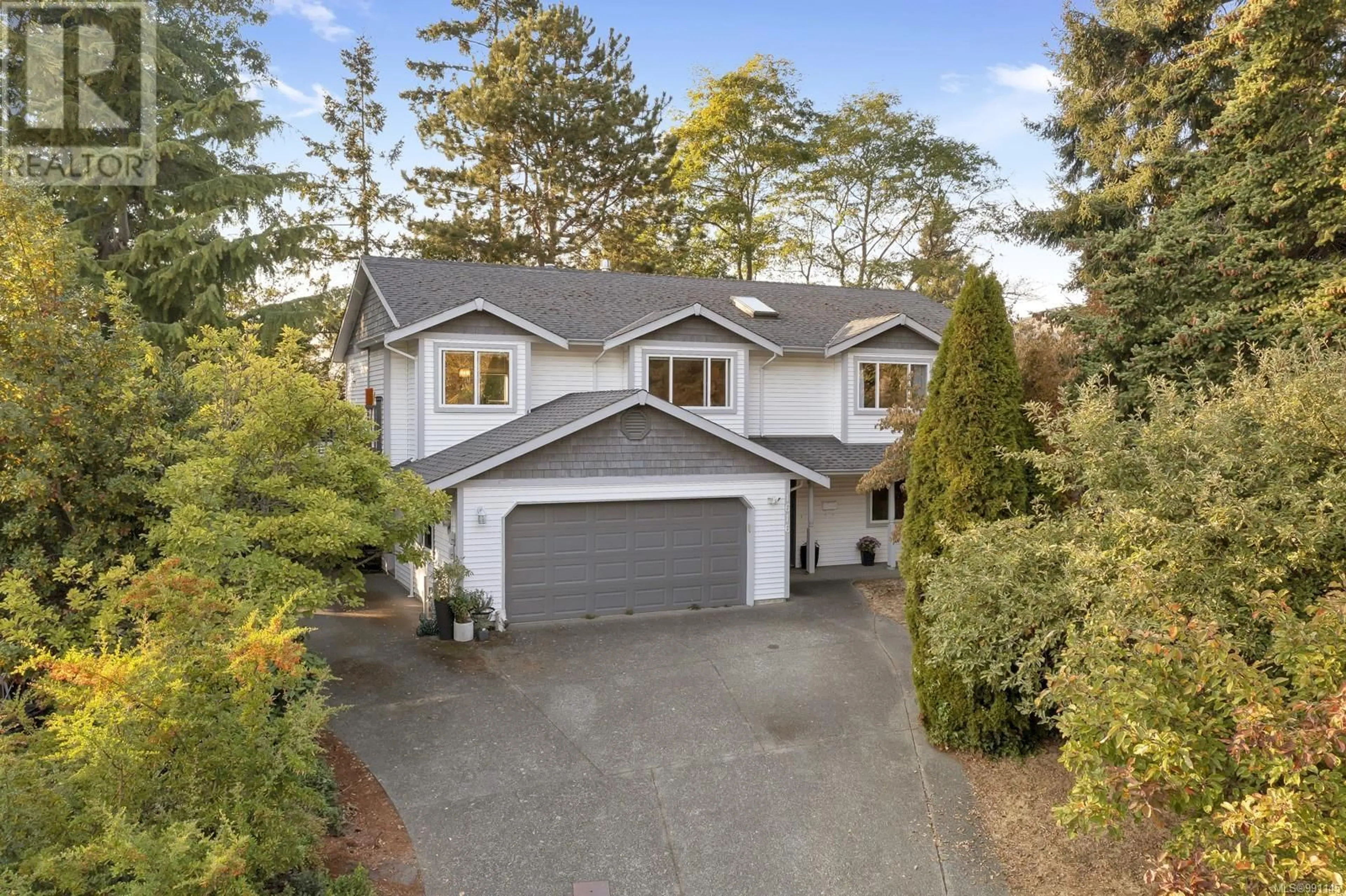 A pic from outside/outdoor area/front of a property/back of a property/a pic from drone, street for 1616 Nelles Pl, Saanich British Columbia V8N6L7