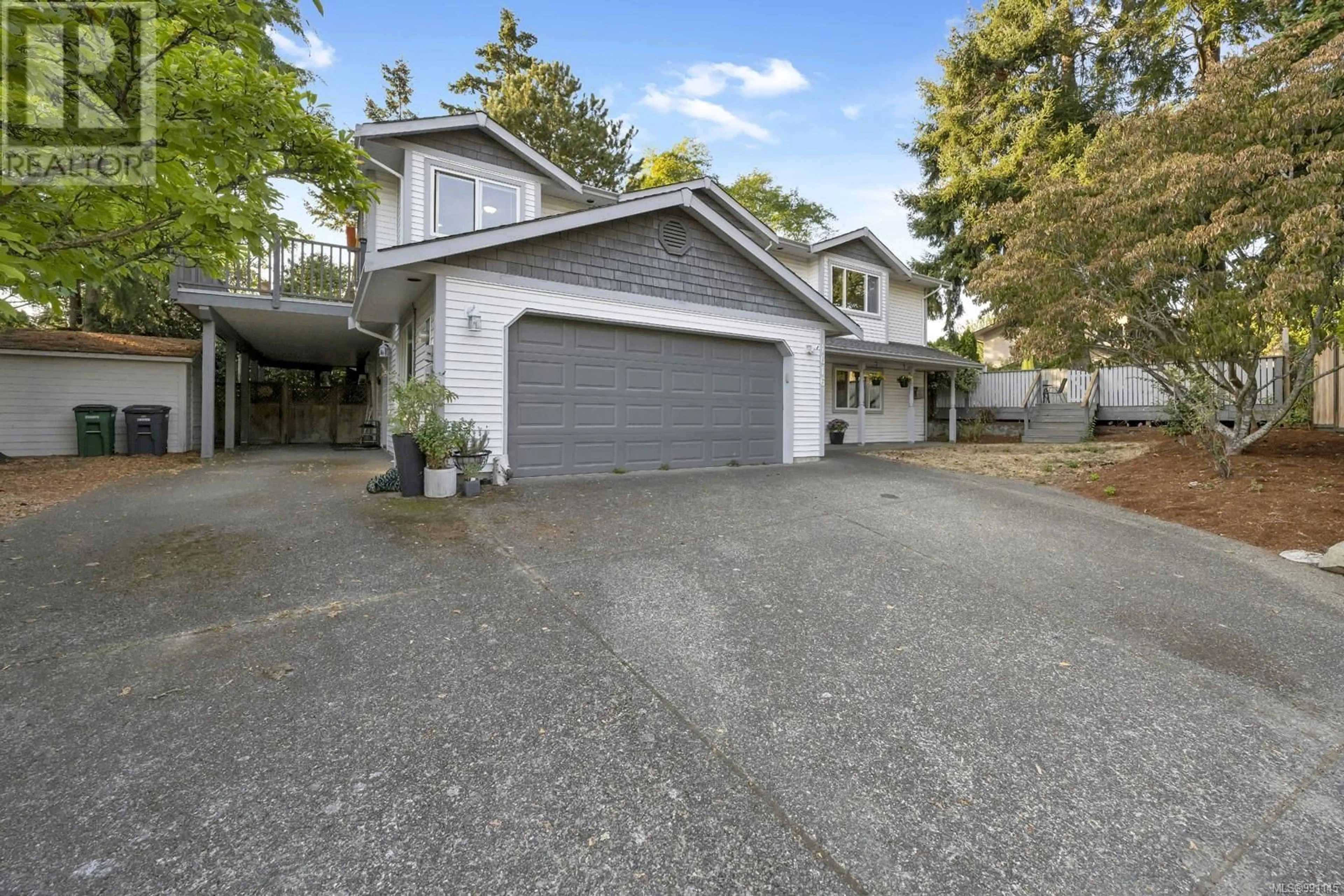 A pic from outside/outdoor area/front of a property/back of a property/a pic from drone, street for 1616 Nelles Pl, Saanich British Columbia V8N6L7