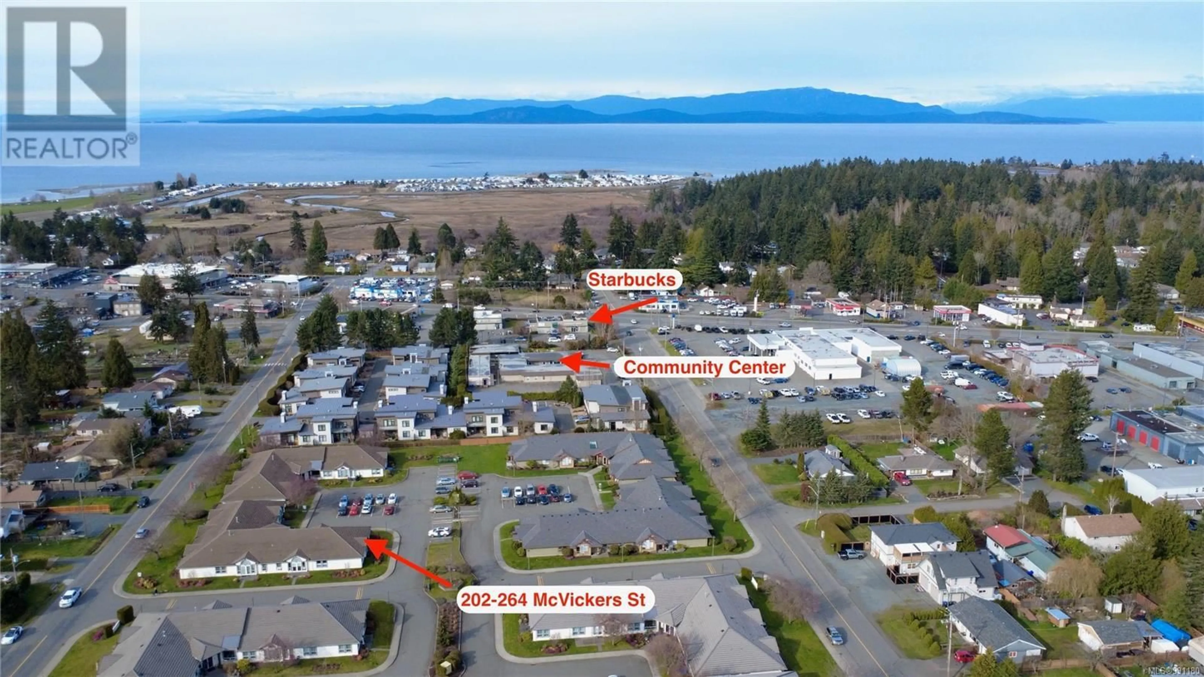 A pic from outside/outdoor area/front of a property/back of a property/a pic from drone, water/lake/river/ocean view for 202 264 McVickers St, Parksville British Columbia V9P2N5