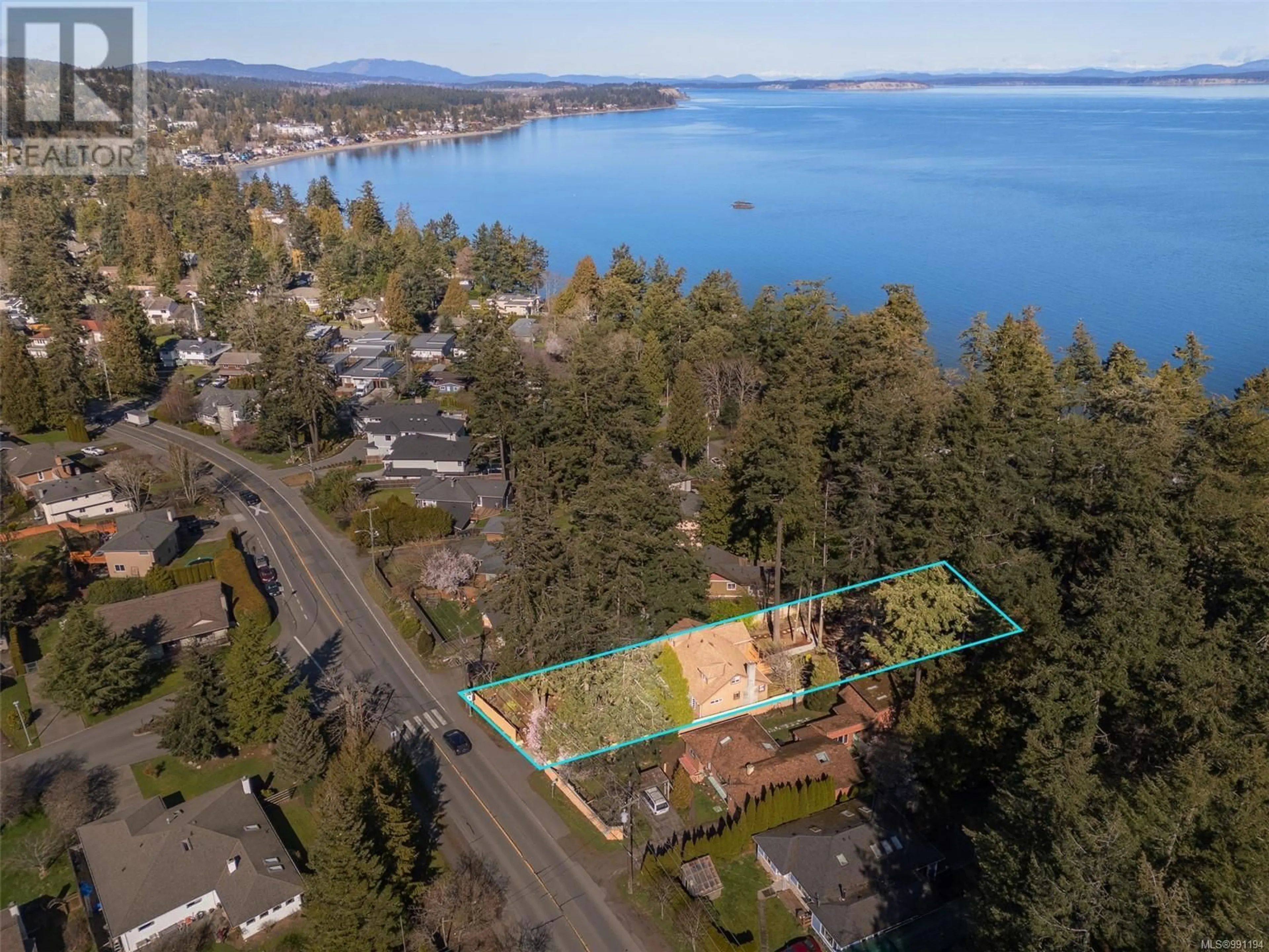 A pic from outside/outdoor area/front of a property/back of a property/a pic from drone, water/lake/river/ocean view for 4815 Cordova Bay Rd, Saanich British Columbia V8Y2J8