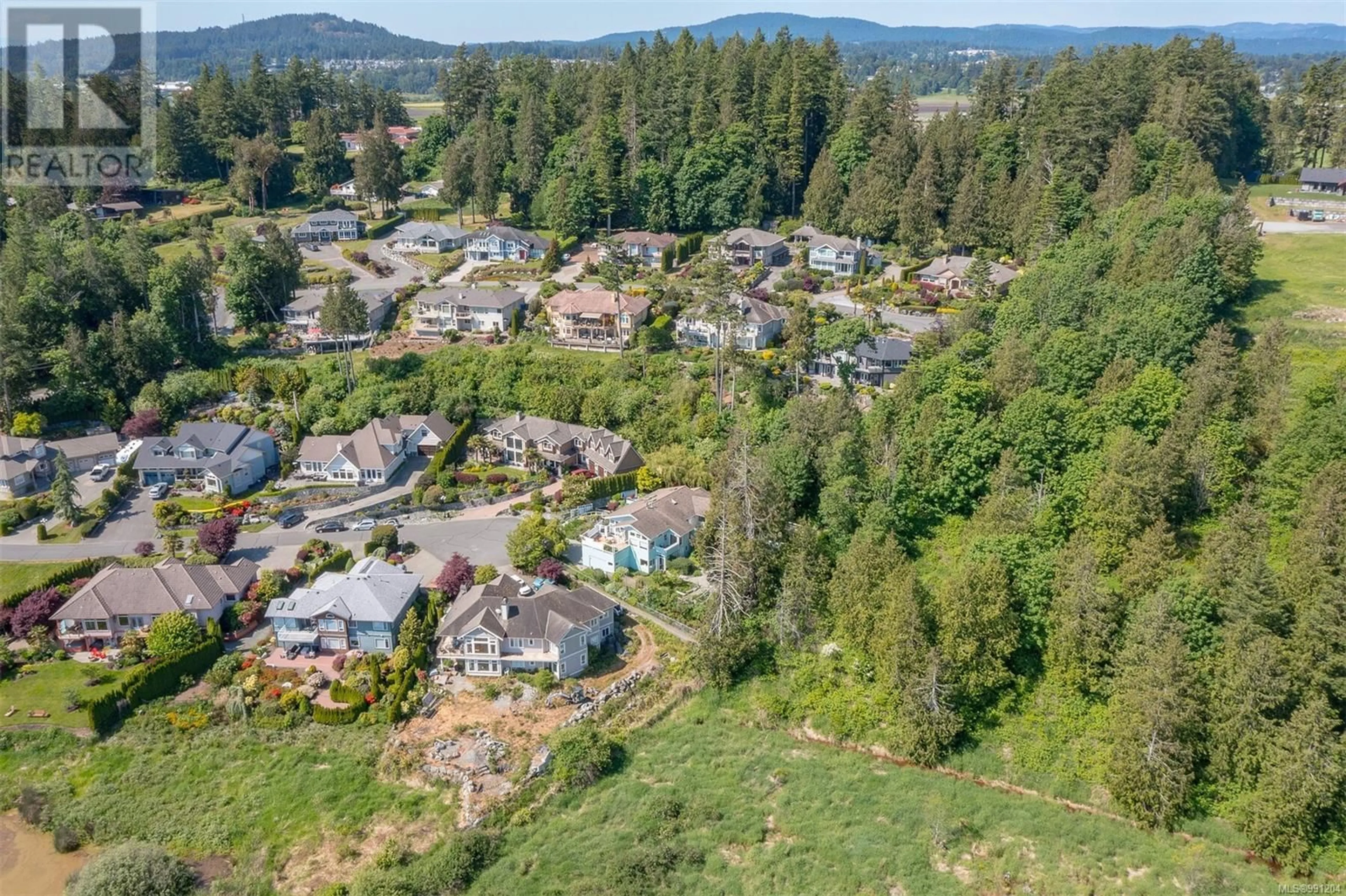 A pic from outside/outdoor area/front of a property/back of a property/a pic from drone, unknown for 7016 BEACH VIEW COURT, Central Saanich British Columbia V8M2J7