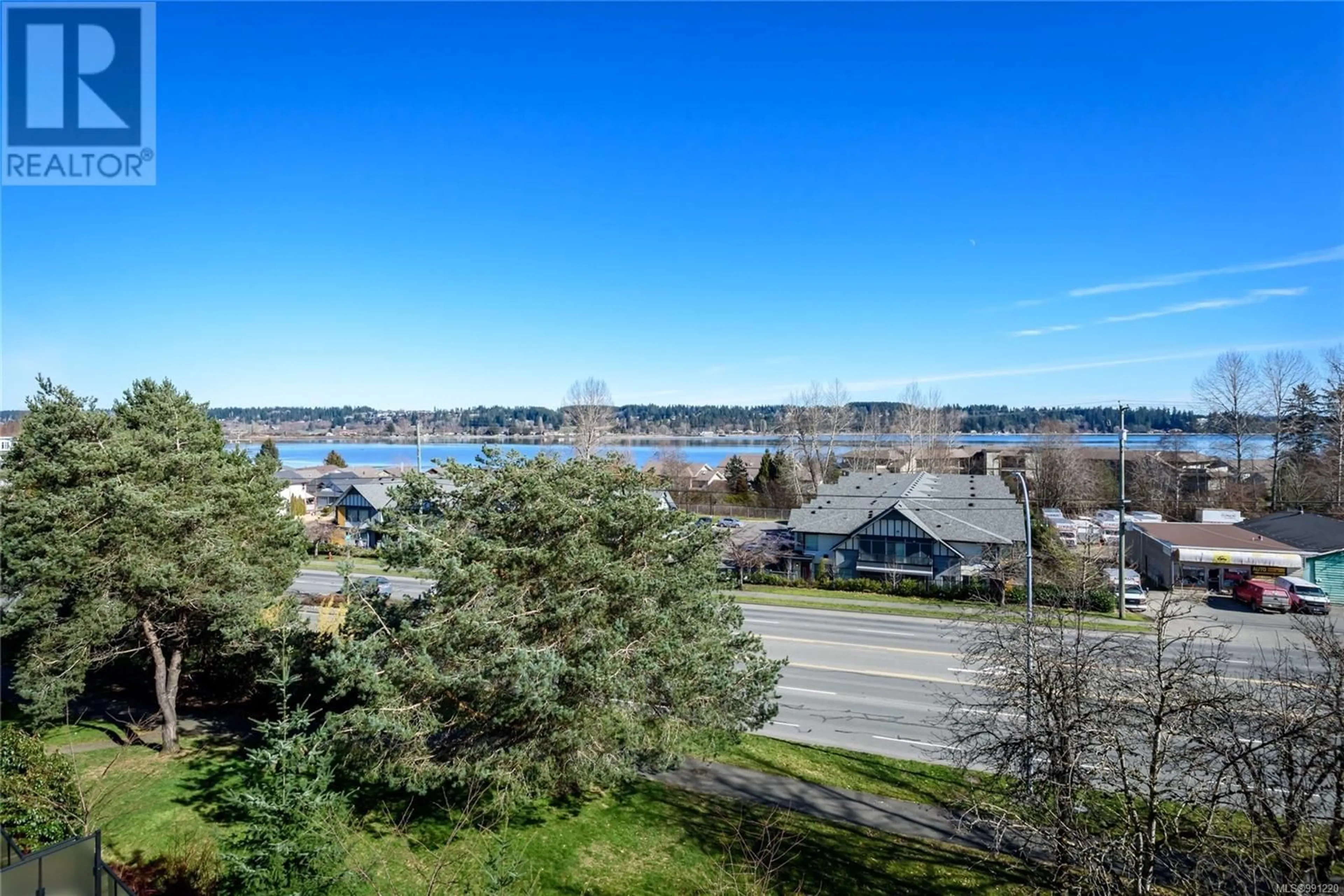 A pic from outside/outdoor area/front of a property/back of a property/a pic from drone, water/lake/river/ocean view for 406 3070 Kilpatrick Ave, Courtenay British Columbia V9N8P1